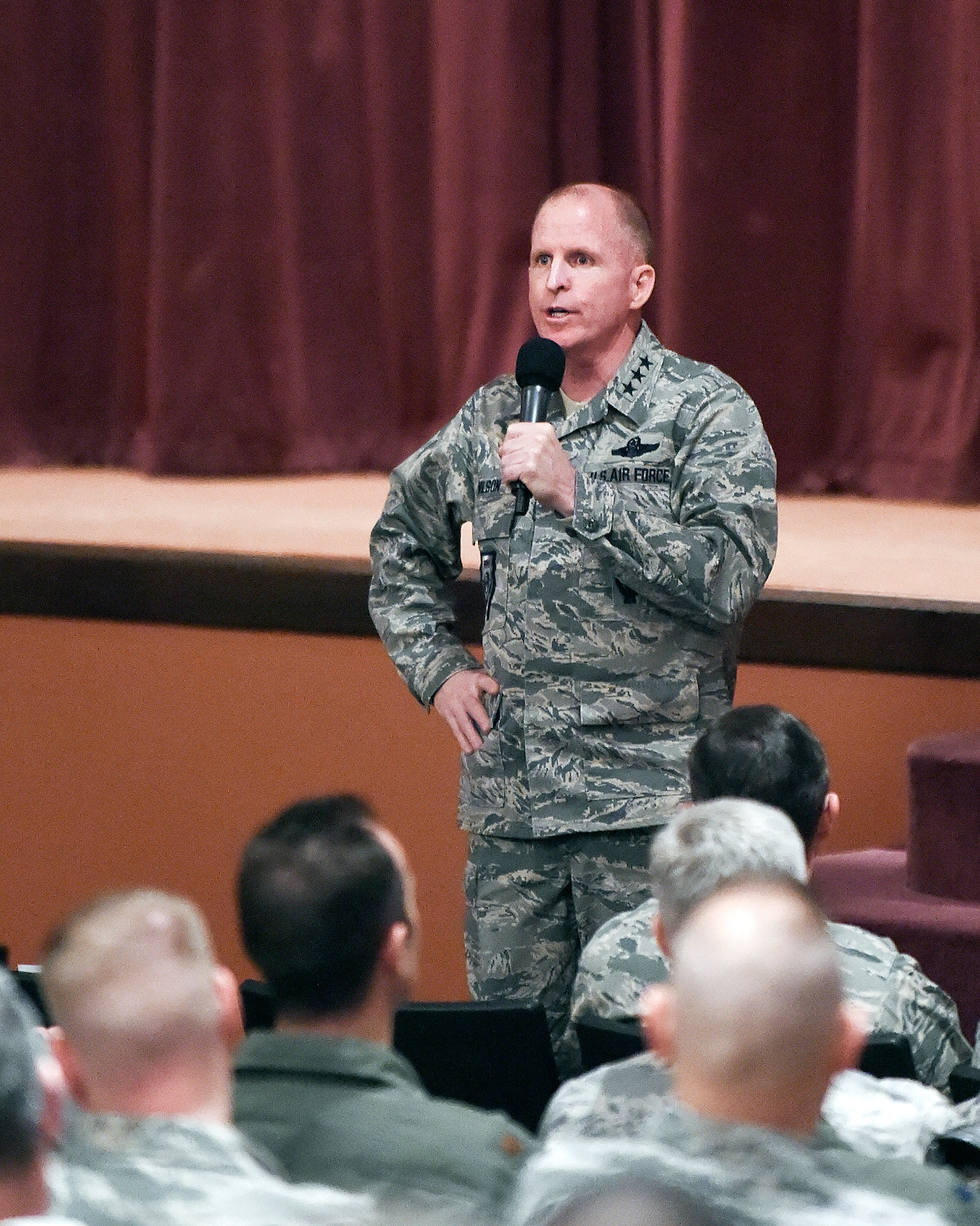 Lt. Gen. Stephen Wilson, commander of Air Force Global Strike Command, answers an Airman’s question during an all-call with the 90th Missile Wing at F.E. Warren Air Force Base, Wyo., theater Feb. 18, 2015. Wilson, and Secretary of the Air Force Deborah Lee James, visited F.E. Warren in preparation for a meeting of the Nuclear Oversight Board at Minot AFB, N.D., Feb. 20. (U.S. Air Force photo by R.J. Oriez/Released.)