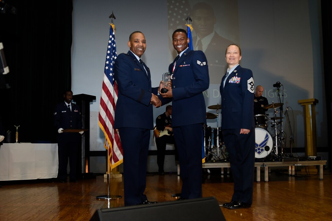 The 79th Medical Wing (79 MDW) held their 2014 Annual Awards Ceremony to recognize the contributions of our outstanding service members. Maj. Gen. Roosevelt Allen, 79 MDW commander and Chief Master Sgt. Michelle Thorsteinson-Richards, 79 MDW Command Chief presented the Airman of the Year award to Senior Airman David Spriggs fro the 579th Medical Group on Joint Base Anacostia-Bolling. He represents our very best and exemplify the Air Force Core values of integrity first, service before self and excellence in all we do. (U.S. Air Force photo/Airman 1st Class Ryan J. Sonnier)
