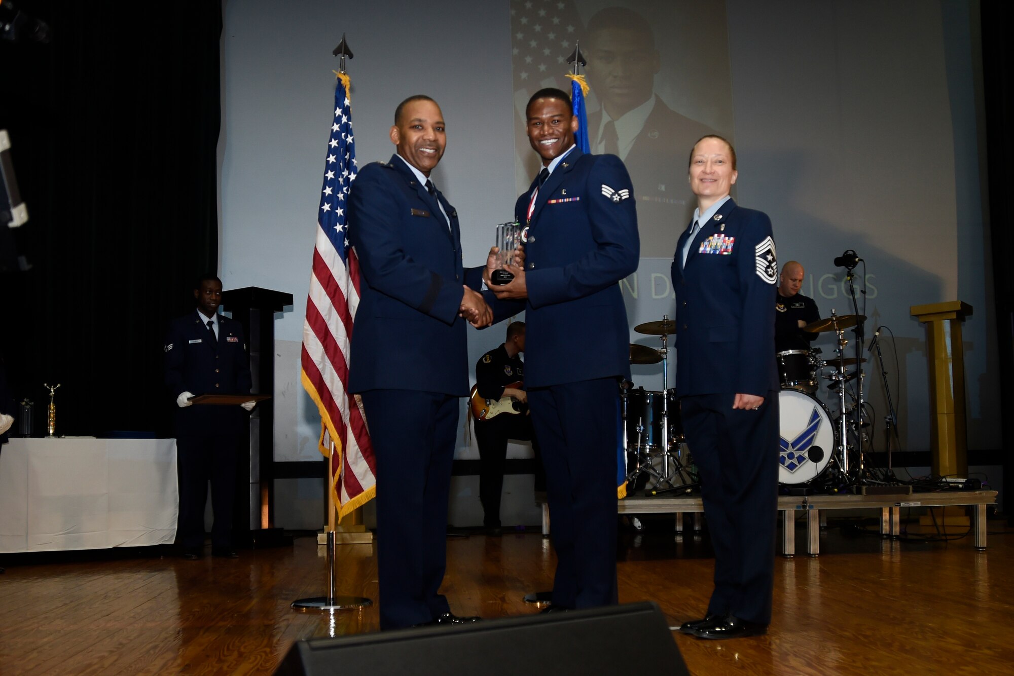 The 79th Medical Wing (79 MDW) held their 2014 Annual Awards Ceremony to recognize the contributions of our outstanding service members. Maj. Gen. Roosevelt Allen, 79 MDW commander and Chief Master Sgt. Michelle Thorsteinson-Richards, 79 MDW Command Chief presented the Airman of the Year award to Senior Airman David Spriggs fro the 579th Medical Group on Joint Base Anacostia-Bolling. He represents our very best and exemplify the Air Force Core values of integrity first, service before self and excellence in all we do. (U.S. Air Force photo/Airman 1st Class Ryan J. Sonnier)
