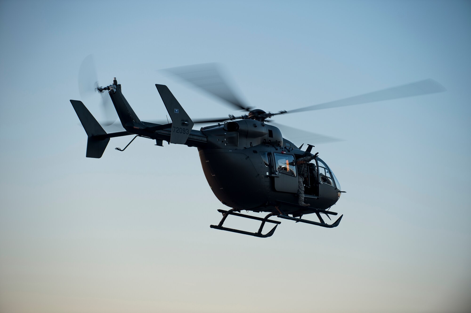 A South Carolina Army National Guard UH-72A helicopter  departs North Auxiliary Airfield after helping Combat Camera Airmen conduct aerial documentation, S.C., Feb. 11, 2015, during an Ability to Survive and Operate Exercise. The ATSO exercise is an annual event designed to test the ability of Air Force combat camera Airmen to survive, operate and provide imagery in an austere environment. Combat camera Airmen document a full range of military operations in support of senior leaders and combatant commanders. (U.S. Air Force photo/Senior Airman Jared Trimarchi)