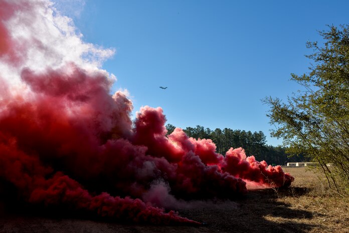 Smoke thrown to simulate a chemical attack blows in wind Feb. 12, 2015 at North Auxiliary Airfield, S.C, during an Ability to Survive and Operate Exercise. The ATSO exercise is an annual event designed to test the ability of Air Force combat camera Airmen to survive, operate and provide imagery in an austere environment. Combat camera Airmen document a full range of military operations in support of senior leaders and combatant commanders. (U.S. Air Force photo/Senior Airman Jared Trimarchi)