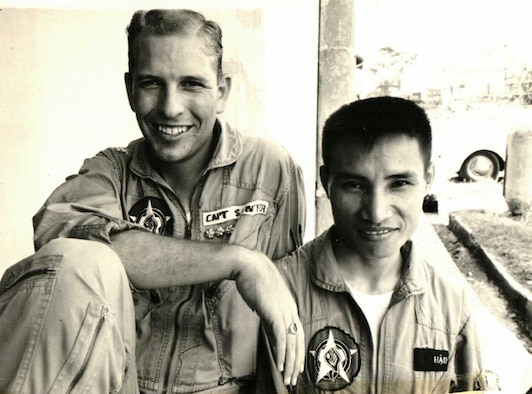 Capt. Keith Sawyer in Saigon with a fellow observer he flew with often.  They became so good at marking enemy targets that soon the Viet Cong had a price on their heads and assassin squads after them.  (Photo courtesy of Keith Sawyer)