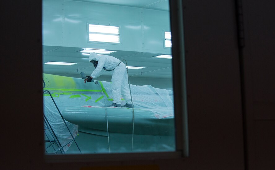 U.S. Air Force Senior Airman Joseph Brown, 23d Equipment Maintenance Squadron aircraft structural maintenance journeyman, paints F-105 Thunderchief “Thud” Feb. 11, 2015, at Moody Air Force Base, Ga. The fabrication flight spent 10 days restoring the paint on the aircraft to get it back to its original state when the Flying Tigers were stationed at McConnell Air Force Base, Kan. (U.S. Air Force photo by Airman 1st Class Ceaira Tinsley/Released)