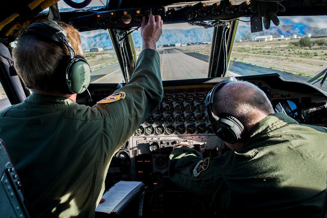 U.S. Air Force Col. Keith Schultz and Lt. Col. Tim Hines, prepare for the engine start of a B-52H Stratofortress on Feb. 12, 2015, Davis-Monthan Air Force Base, Ariz. The B-52 was decommissioned in 2008 and has spent the last seven years in 1000-type storage in the "Boneyard,” but is being restored and will eventually join the active B-52 fleet. (U.S. Air Force photo by Master Sgt. Greg Steele/Released)