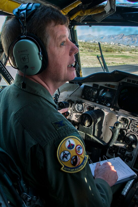 U.S. Air Force Capt. Carl Johnson, a B-52 navigator assigned to the 2nd Operations Group at Barksdale Air Force Base, La., prepares for the first flight of a B-52H Stratofortress that is being regenerated at the 309th Aerospace Maintenance and Regeneration Group on Feb. 12, 2015, Davis-Monthan Air Force Base, Ariz. The B-52 was decommissioned in 2008 and has spent the last seven years in 1000-type storage in the "Boneyard,” but is being restored and will eventually join the active B-52 fleet. (U.S. Air Force photo by Master Sgt. Greg Steele/Released)