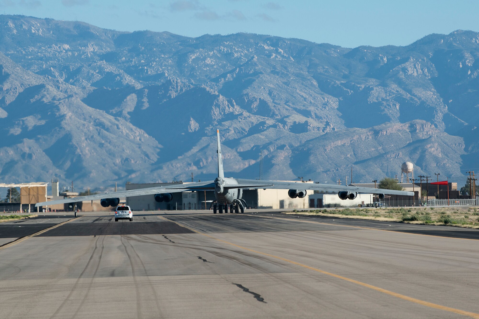 A U.S. Air Force B-52H Stratofortress, known as the "Ghost Rider," taxis as part of a test of its steering capability after being taken out of long-term storage, Feb. 12, 2015, Davis-Monthan Air Force Base, Ariz. The aircraft was decommissioned in 2008 and was selected to be taken out of storage and regenerated to eventually rejoin the active B-52 fleet. (U.S. Air Force photo by Master Sgt. Greg Steele/Released)