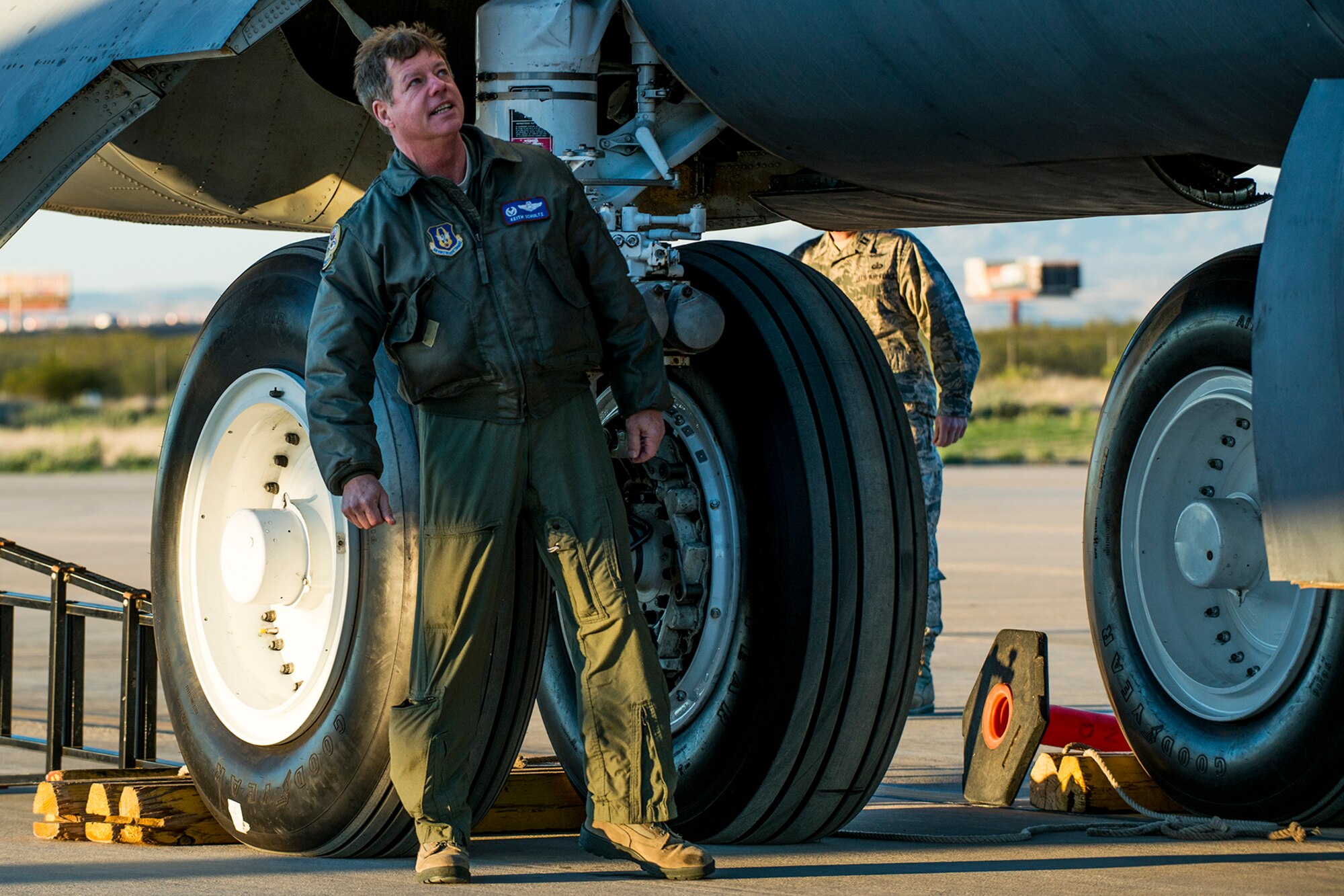 U.S. Air Force Col. Keith Schultz, 307th Operations Group commander, performs a preflight inspection of a B-52H Stratofortress before a taxi test on Feb. 12, 2015, Davis-Monthan Air Force Base, Ariz. Schultz, who has over 6,500 flying hours in the B-52, will pilot the aircraft on its flight from the "Boneyard" since sitting in storage for seven years after being decommissioned in 2008. (U.S. Air Force photo by Master Sgt. Greg Steele/Released)