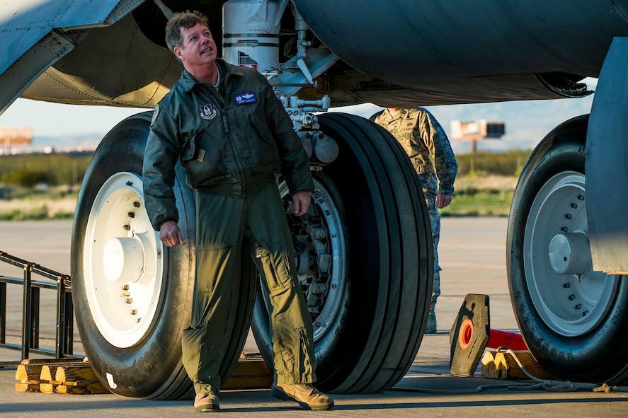U.S. Air Force Col. Keith Schultz, 307th Operations Group commander, performs a preflight inspection of a B-52H Stratofortress before a taxi test on Feb. 12, 2015, Davis-Monthan Air Force Base, Ariz. Schultz, who has over 6,500 flying hours in the B-52, will pilot the aircraft on its flight from the "Boneyard" since sitting in storage for seven years after being decommissioned in 2008. (U.S. Air Force photo by Master Sgt. Greg Steele/Released)