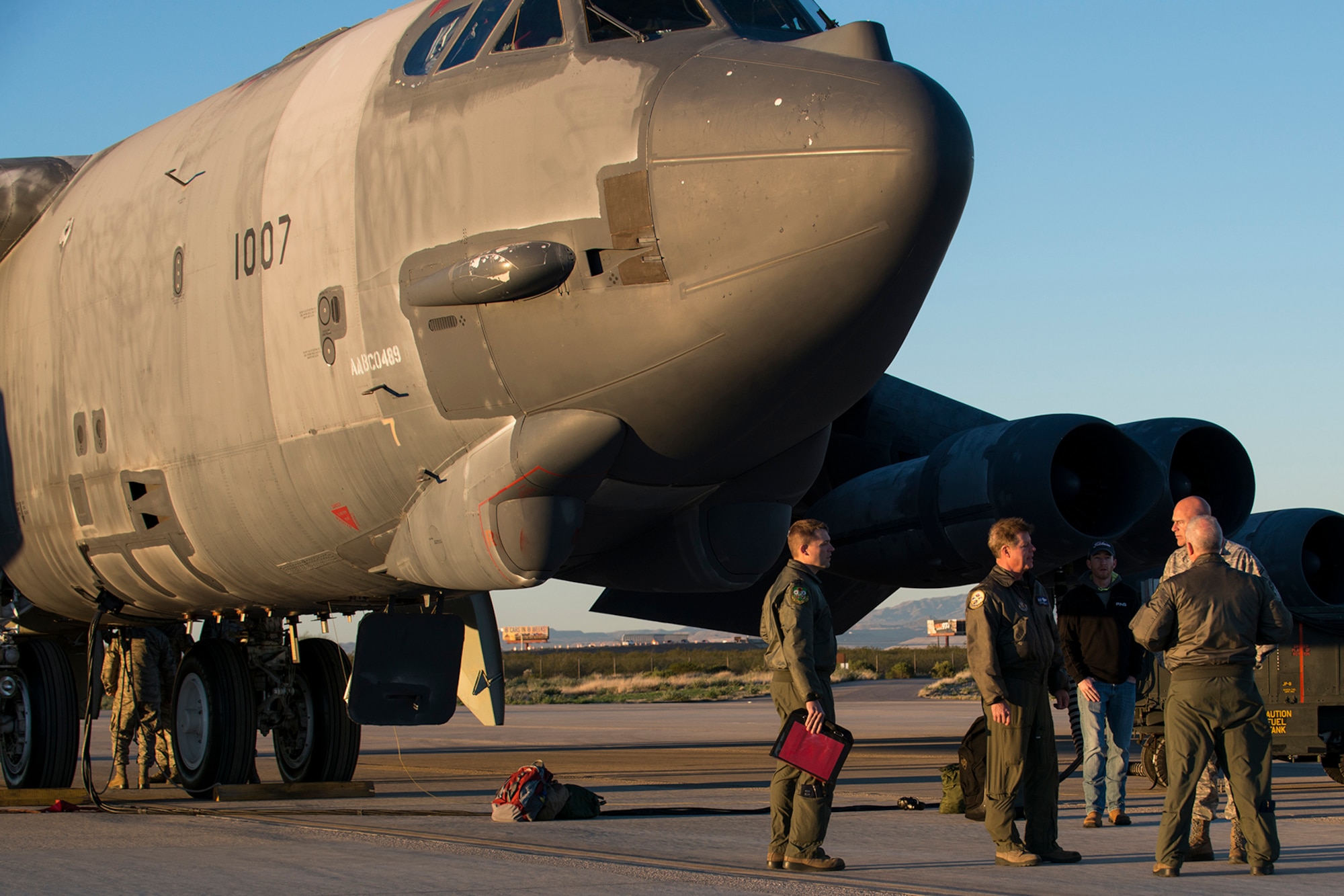 Aircrew arrive to perform a taxi test on a B-52H Stratofortress, Feb. 12, 2015, Davis-Monthan Air Force Base, Ariz. The aircraft, known as the "Ghost Rider,” was decommissioned in 2008 and has been sitting in storage at the 309th Aerospace Maintenance and Regeneration Group's "Boneyard.” (U.S. Air Force photo by Master Sgt. Greg Steele/Release)