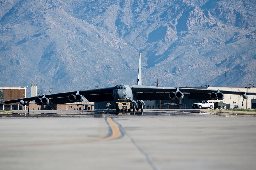 A U.S. Air Force B-52H Stratofortress is towed from a maintenance area at the 309th Aerospace Maintenance and Regeneration Group, Feb. 11, 2015, Davis-Monthan Air Force Base, Ariz. The aircraft, tail number 61-1007 and known as the "Ghost Rider,” is being regenerated for active service after sitting in storage since 2008 when it was decommissioned and sent the Boneyard. (U.S. Air Force photo by Master Sgt. Greg Steele/Released)