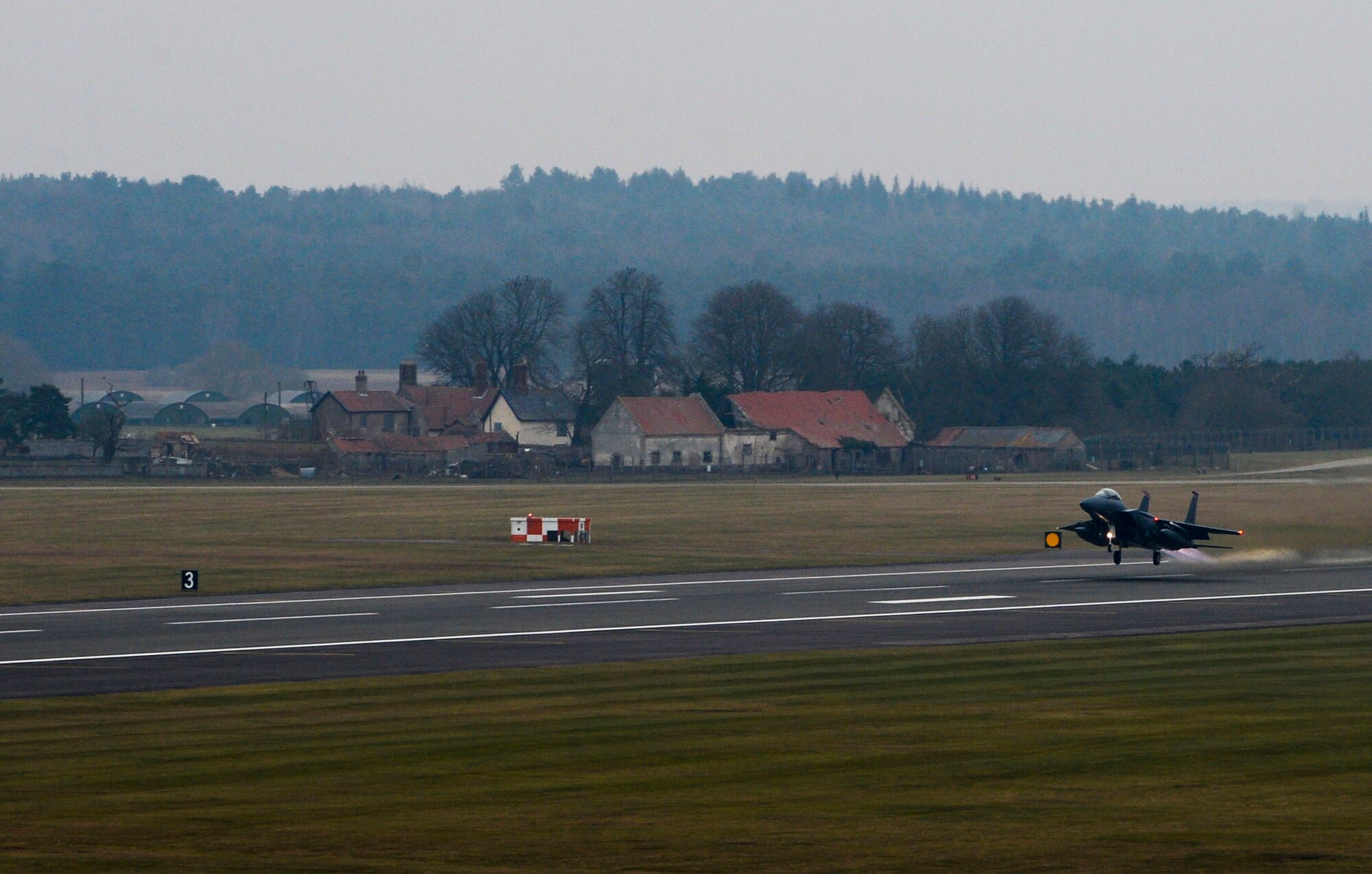 An F-15E Strike Eagle takes-off from Royal Air Force Lakenheath, England, Feb. 12, 2015.The 48th Fighter Wing participated in exercise Purple Windmill in Vliehors Range, Netherlands, which provided close air support, surface-attack and dynamic-targeting training with Dutch and French joint terminal attack controllers. (U.S. Air Force photo by Staff Sgt. Stephanie Longoria/Released)