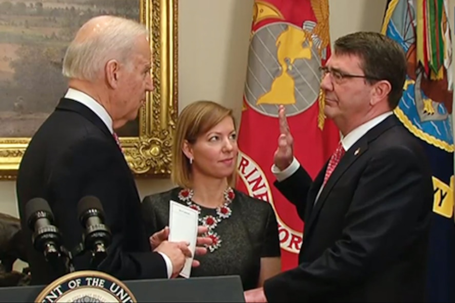 Vice President Joe Biden swears in Ash Carter as the 25th defense secretary as Carter's wife, Stephanie, looks on during a private ceremony at the White House, Feb. 17, 2015. (DOD photo)