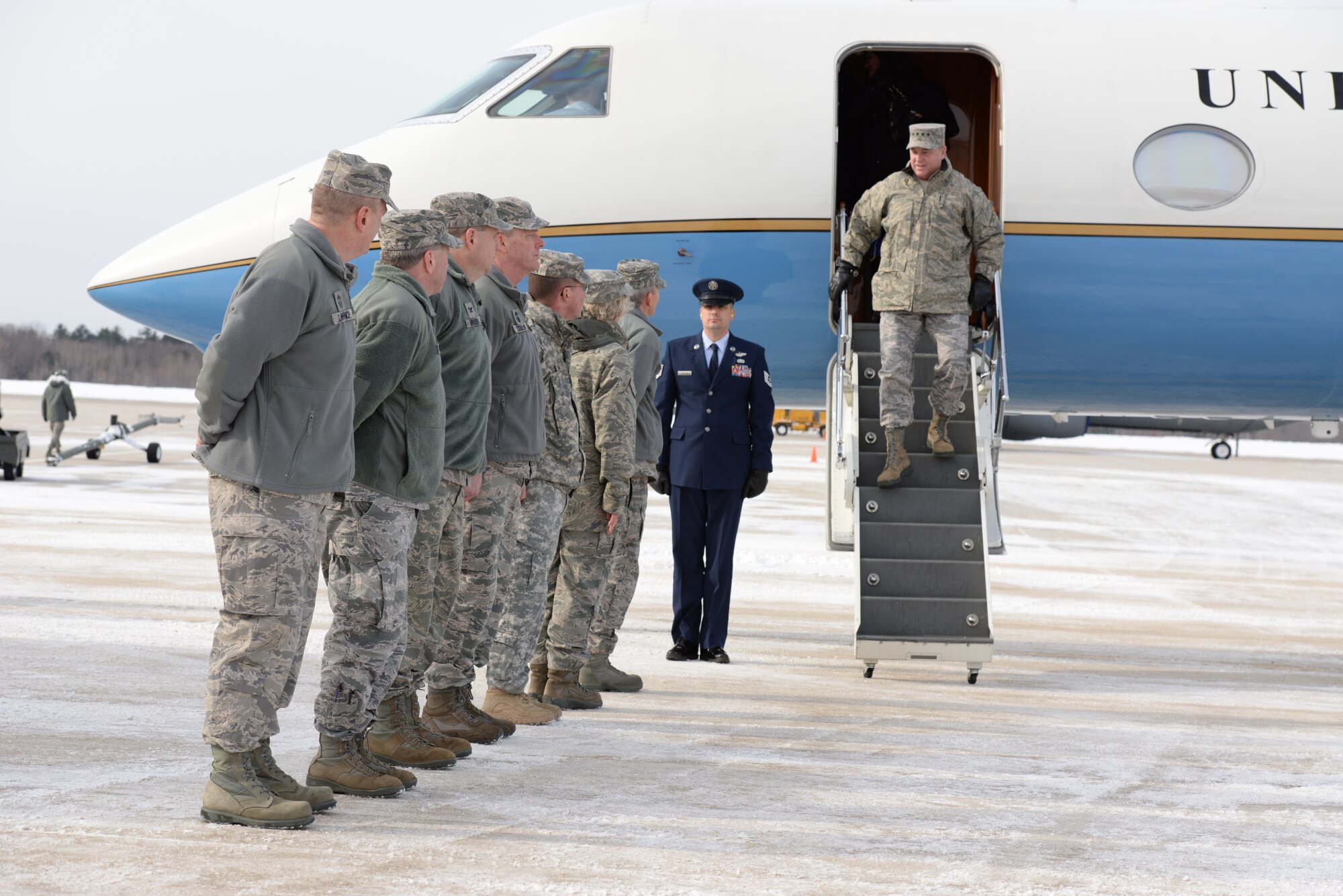 General Mark A. Welsh III, Chief of Staff of the United States Air Force disembarks from his aircraft on Feb 17, 2015 at Pease Air National Guard Base, N.H. Welsh visited the base to speak to Airmen and community leaders as well as discuss the base’s next aircraft, the KC-46 Pegasus.  (U.S. Air National Guard photo by Staff Sgt. Curtis J. Lenz)