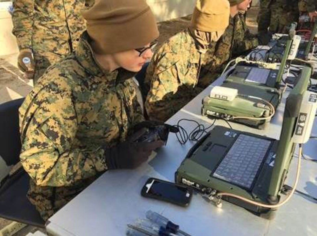 Marines of BCE10-15 learn how to control the robot.