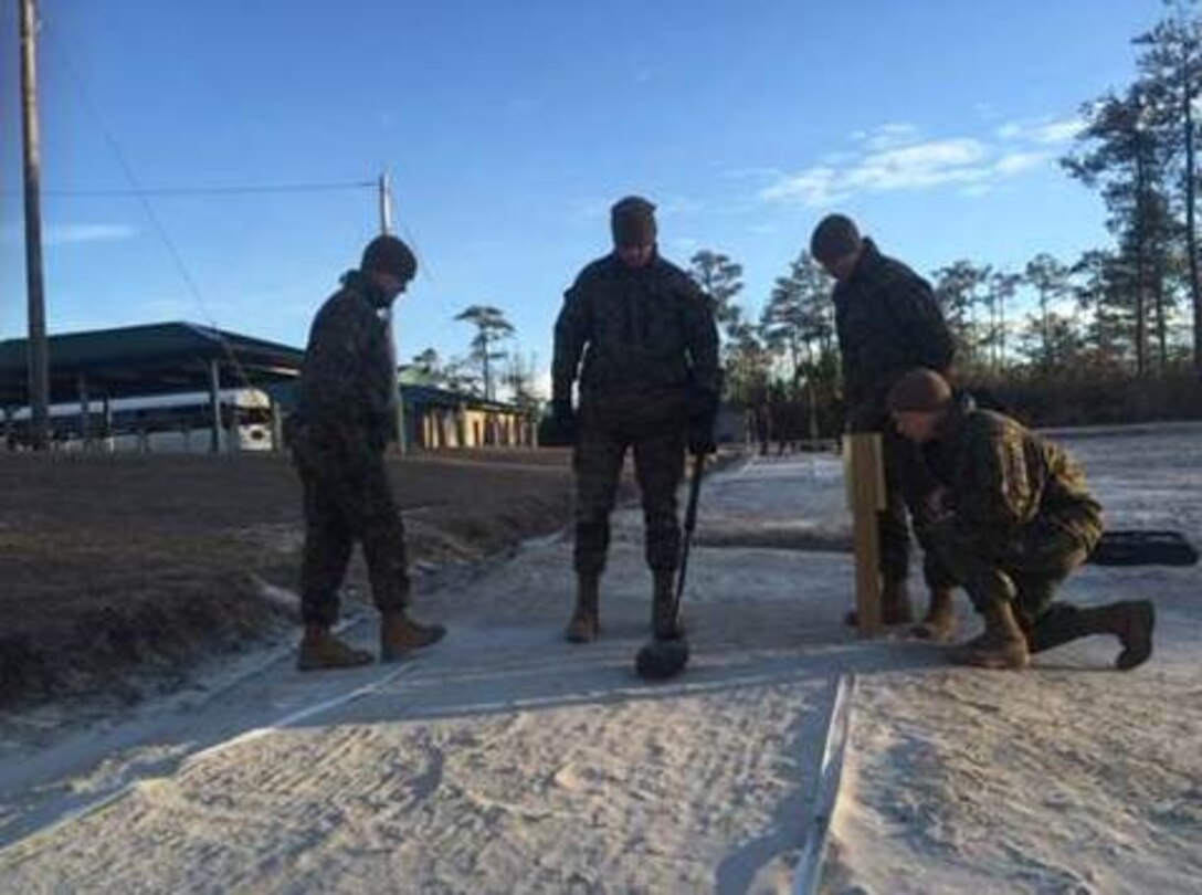 Marines of BCE 11-15 practice sweeping techniques with the VMR-2.