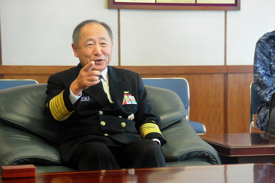 Japanese Navy Admiral Katsutoshi Kawano, chief of staff, Joint Staff, Self-Defense Forces meets with U.S. Marine Corps Sgt. Maj. Bryan Battaglia, senior enlisted advisor to the chairman of the Joint Chiefs of Staff, on Camp Ichigaya, Tokyo, Japan, Feb. 10, 2015.