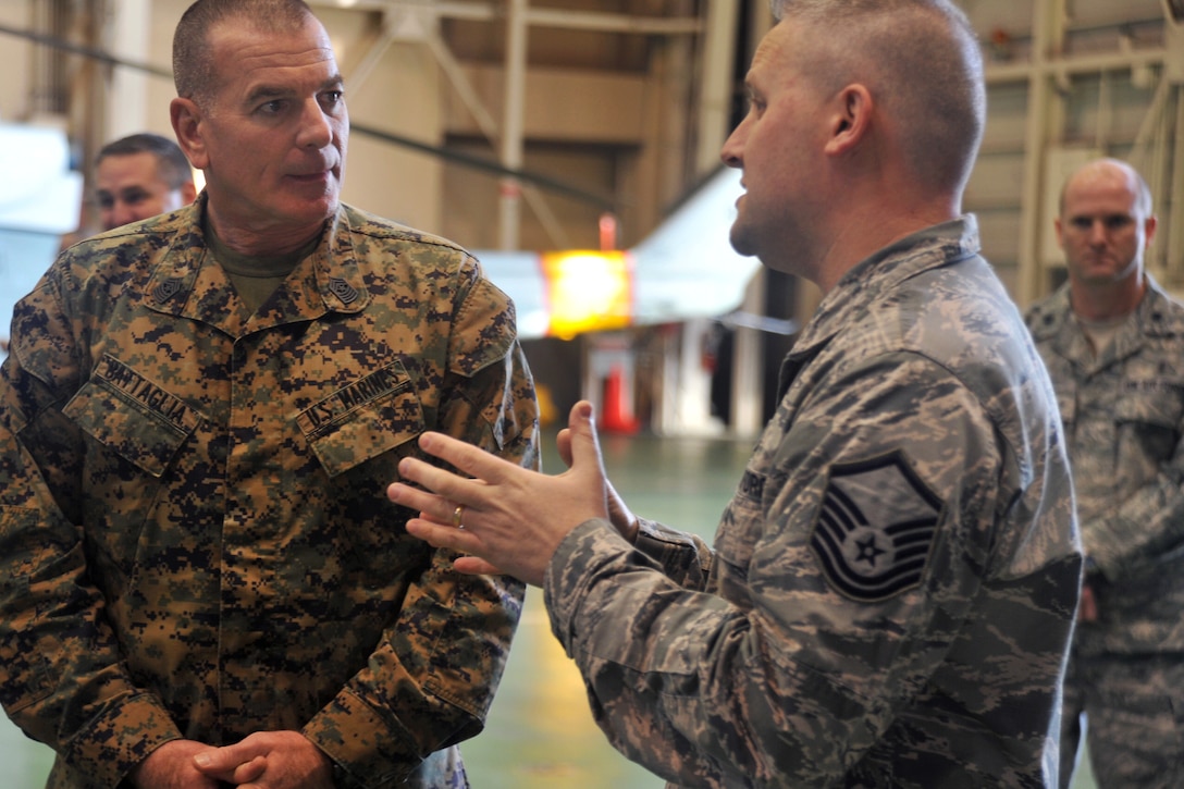 U.S. Marine Corps Sgt. Maj. Bryan Battaglia, left, senior enlisted ...