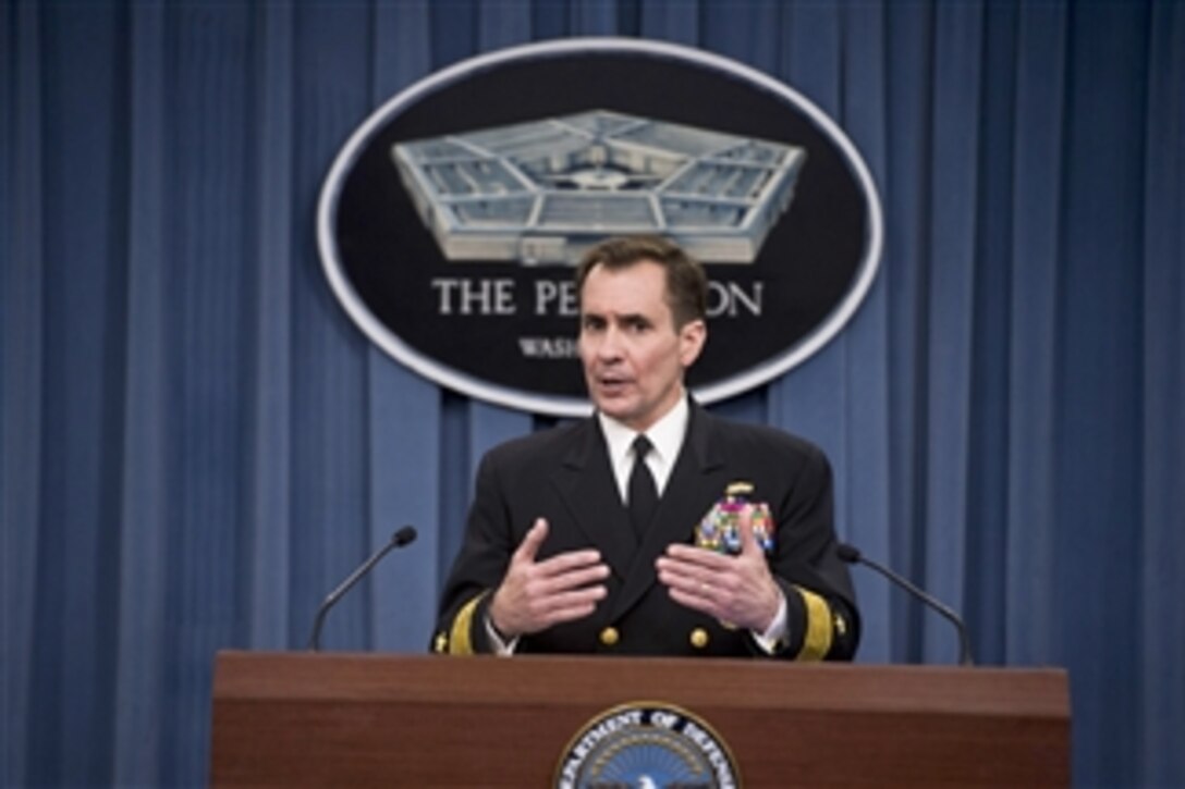 Pentagon Press Secretary Navy Rear Adm. John Kirby answers questions during a press briefing at the Pentagon, Feb. 18, 2015. 