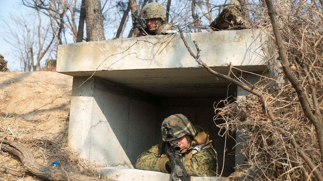 U.S. Marines hold defensive positions during Korean Marine Exchange Program 15-17 Feb. 10 at the Cham Sae Mi Close-Quarters Battle Training Facility in Pohang, Republic of Korea. From planning to execution, KMEP 15-17 has been a bilateral and collaborative effort between ROK and U.S. Marine Corps forces. The U.S. Marines are with Company I, 3rd Battalion, 3rd Marine Regiment, currently assigned to 4th Marine Regiment, 3rd Marine Division, III Marine Expeditionary Force under the unit deployment program. 