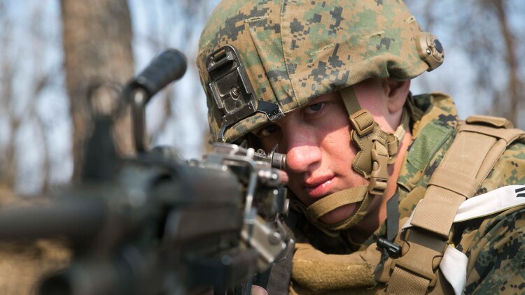 U.S. Marine Lance Cpl. Nick A. Foss, from Lakeville, Minnesota, looks down the sights of his M249 squad automatic weapon during Korean Marine Exchange Program 15-17 Feb. 10 at the Cham Sae Mi Close-Quarters Battle Training Facility in Pohang, Republic of Korea. KMEP 15-17 is just one iteration in a series of continuous bilateral training exercises that enhance the ROK and U.S. alliance, promote stability on the Korean Peninsula and strengthen ROK and U.S. military capabilities and interoperability. Foss is a machine gunner with Company I, 3rd Battalion, 3rd Marine Regiment, currently assigned to 4th Marine Regiment, 3rd Marine Division, III Marine Expeditionary Force under the unit deployment program. 