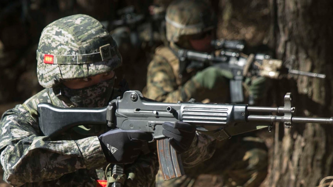 Republic of Korea and U.S. Marines assault enemy defensive positions during Korean Marine Exchange Program 15-17 Feb. 13 at the Cham Sae Mi Close-Quarters Battle Training Facility in Pohang, Republic of Korea. KMEP 15-17 is just one iteration in a series of continuous bilateral training exercises that enhance the ROK and U.S. alliance, promote stability on the Korean Peninsula and strengthen ROK and U.S. military capabilities and interoperability. The ROK Marines are with Company 6, 32nd Battalion, 1st ROK Marine Division. The U.S. Marines are with Company K, 3rd Battalion, 3rd Marine Regiment, currently assigned to 4th Marine Regiment, 3rd Marine Division, III Marine Expeditionary Force under the unit deployment program. 