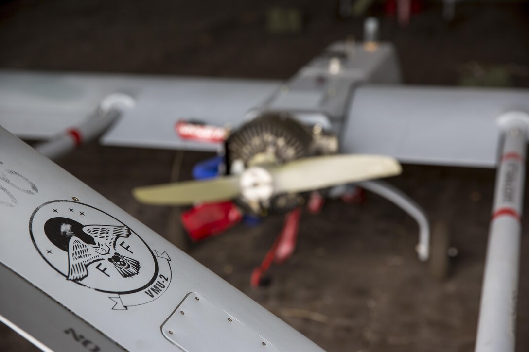 The symbol of “Night Owls” Marine Unmanned Aerial Vehicle Squadron 2, Marine Aircraft Group 14, 2nd Marine Aircraft Wing, is displayed on a panel of the RQ-7B Shadow unmanned aerial vehicle as it sits awaiting maintenance checks prior to take off aboard Hurlburt Field, Eglin Air Force Base, Florida, Feb.3, 2015. VMU-2 flew the Shadow UAV as part of a training exercise and to provide aerial support to of U.S. Marine Corps Forces Special Operations Command training in the surrounding area. Using the Shadow, the VMU-2 team is able to relay communications between units, provide reconnaissance and surveillance, as well as laser guide aerial or ground attacks on the objective. (U.S. Marine Corps photo by Lance Corporal Olivia McDonald/Released)