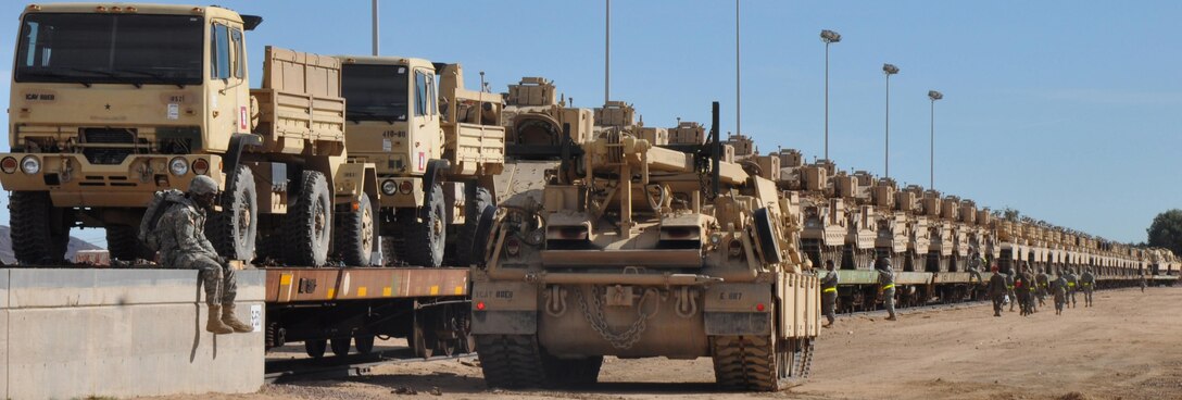 Lance Cpl. Michael Miller and Lance Cpl. Kyle Osborne, Marines with Combat Logistics Battalion 5, Camp Pendleton, Calif., oversee unloading of equipment with solders from 1st Cavalry Division out of Ft. Hood, Texas, as part of their Railway Operations training at the Yermo Annex on Marine Corps Logistics Base Barstow, Calif., Feb. 11.  The 80-hour RailOps training is now being offered through Marine Corps Training Information Management System and includes class instruction and hands-on learning. 