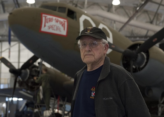 Don Clark poses in front of a C-47A Skytrain Jan. 28, 2015, at the Air Mobility Command Museum on Dover Air Force Base, Del. During World War II, Clark piloted C-47A and flew 81 missions, to include 27 combat missions. (U.S. Air Force photo/Airman 1st Class Zachary Cacicia)