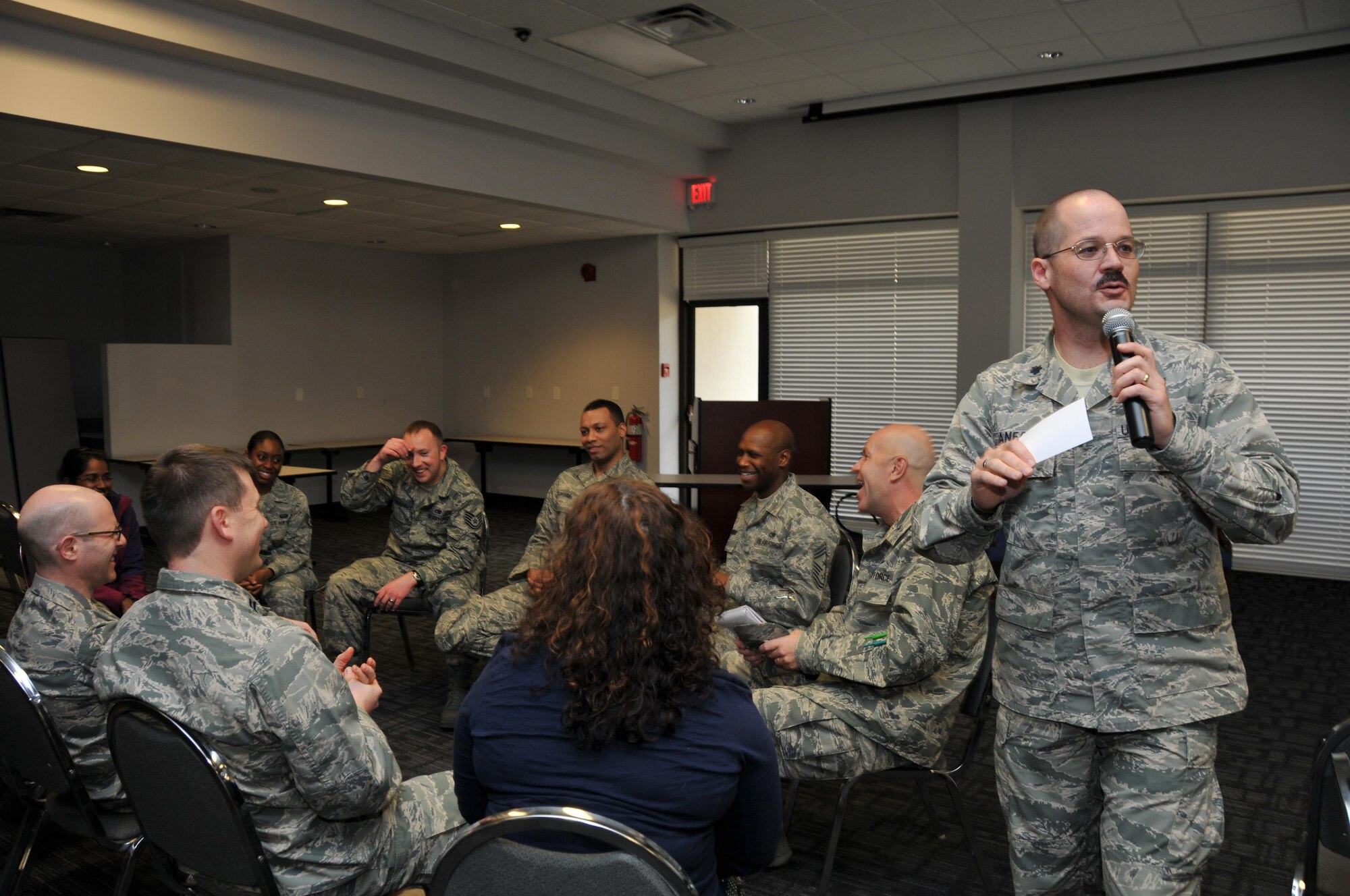 Lt. Col. James F. Danford, the 94th Airlift Wing chaplain, addresses members of Team Dobbins during Wingman Day at Dobbins Air Reserve Base, Ga., Feb. 8, 2015. Dobbins participated in the Air Force-wide Wingman Day to remind the community what it means to be a wingman and how it benefits the base as a whole. (U.S. Air Force photo/Senior Airman Andrew Park)