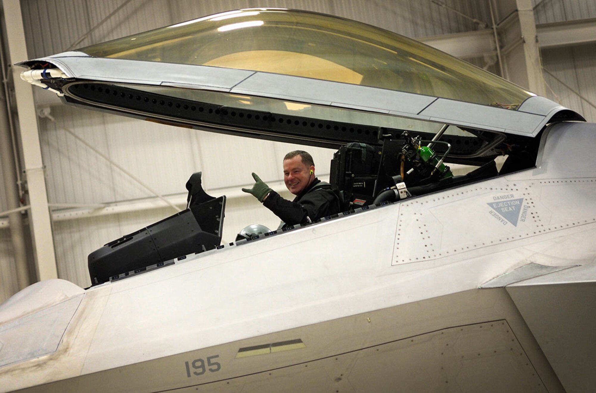 Percle waits for clearance to leave a hangar in an F-22 Raptor for the flight which made him the first active-duty pilot to break 1,000 flight hours in the Raptor Feb. 3.  (U.S. Air Force photo/Justin Connaher)