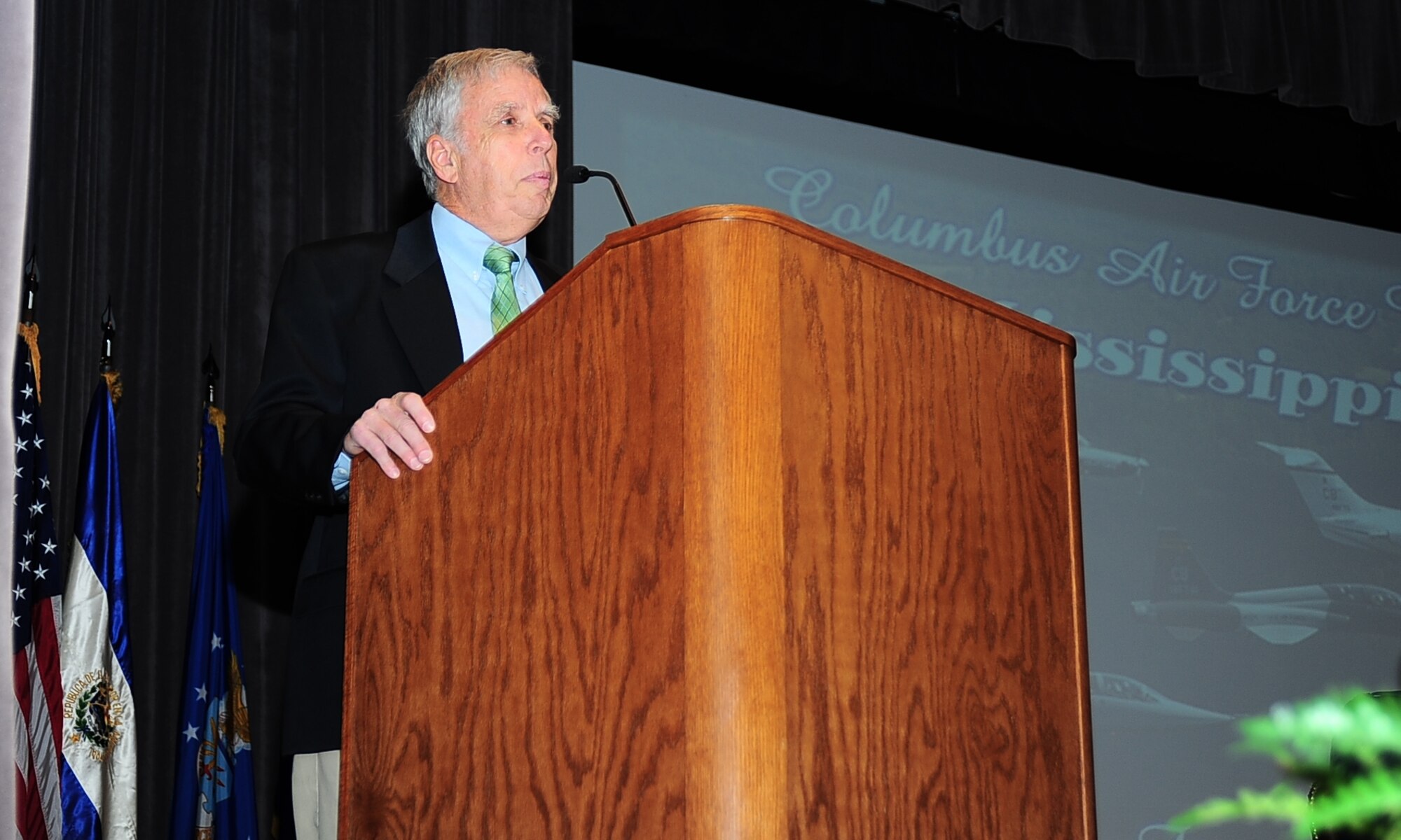 Retired Air Force Gen. Robert “Doc” Foglesong speaks at Specialized Undergraduate Pilot Training Class 15-05’s graduation ceremony at Columbus Air Force Base, Mississippi, Feb. 13, 2015. The former 14th Flying Training Wing commander spoke about Air Force core values, the unity in our military and the pride in America. (U.S. Air Force photo/Airman John Day)