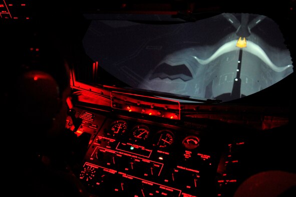 Staff Sgt. Michael Weidman, 92nd Operations Support Squadron instructor boom operator, conducts simulator training during a night air refueling simulation Feb. 17, 2015, at Fairchild Air Force Base, Wash. More than 50 percent of their refueling operations take place at night. (U.S. Air Force photo/Airman 1st Class Nicolo J. Daniello)
