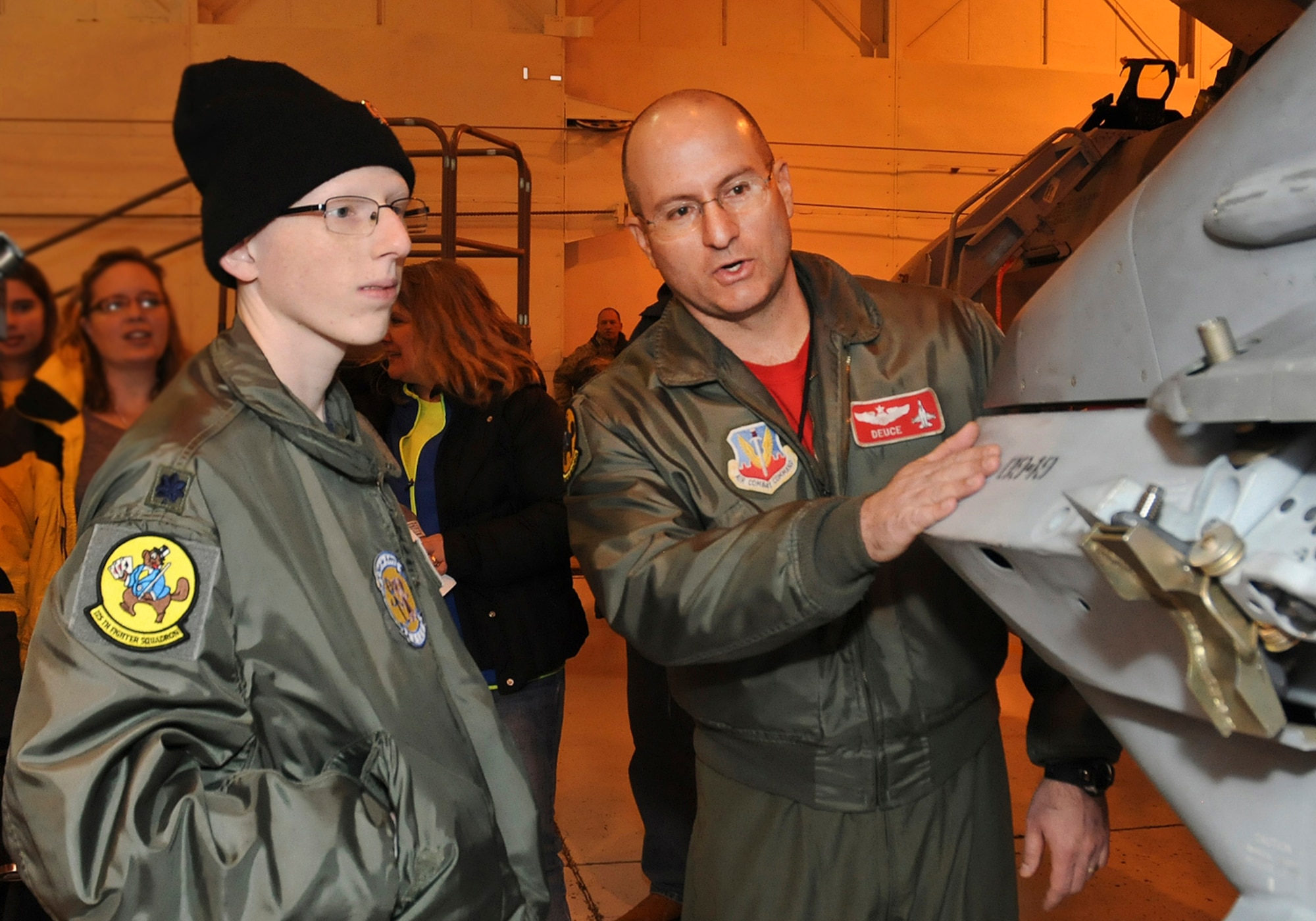 - Josh Payton, the 138th Fighter Wing's "pilot for a day" is briefed on the operations of an F-16 by Maj. Michael "Deuce" Scorsone Feb. 19, 2015, at the Tulsa Air National Guard base, Tulsa, Okla.  The pilot for a day program is intended to recognize and honor children with potentially life threatening illnesses and started at the 138th in May 2012, and has hosted seven children since it began.  (U.S. National Guard photo by Senior Master Sgt.  Preston L. Chasteen/Released)