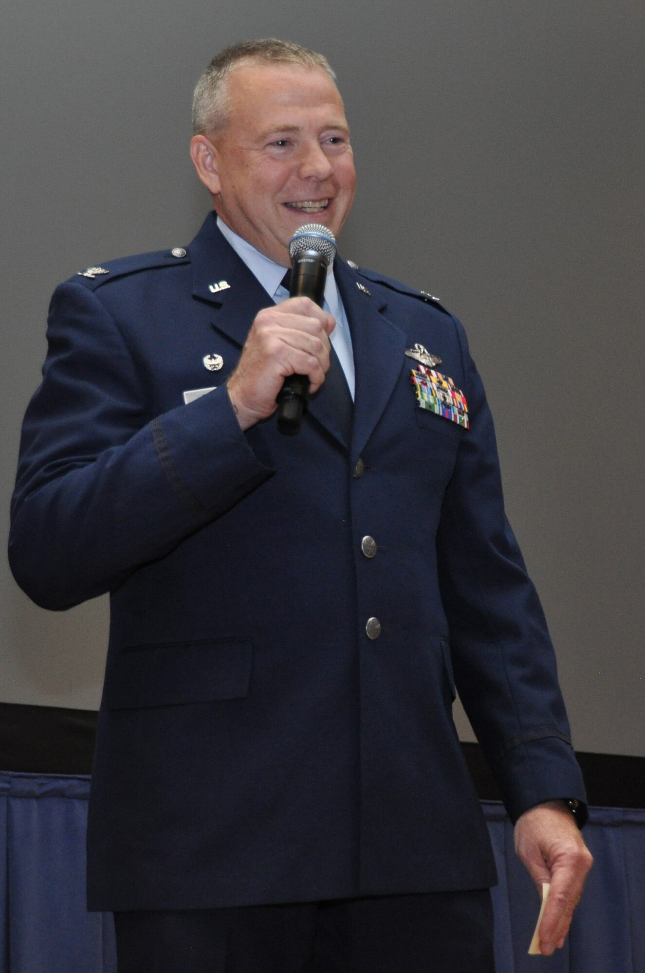 PETERSON AIR FORCE BASE, Colo. – Col. Robert Stanton addresses the crowd after assuming command of the 302nd Operations Group during a ceremony here Feb. 19, 2015. He said he is coming into the position with three expectations: to give 100 percent, to use innovation in these challenging times, and the need to have fun, as Airmen are young, flying in the Air Force, and need to enjoy the moment. This will be Stanton’s second wing with a special mission. His last position was the Deputy Commander of the 403rd Operations Group, Keesler AFB, Miss. which has the “Hurricane Hunters” aerial weather reconnaissance mission. The 302nd Operations Group is home to the only Reserve wing with an aerial firefighting mission. Pittman, 302nd Airlift Wing Commander, was the presiding official of the ceremony. (U.S. Air Force photo/Master Sgt. Daniel Butterfield)