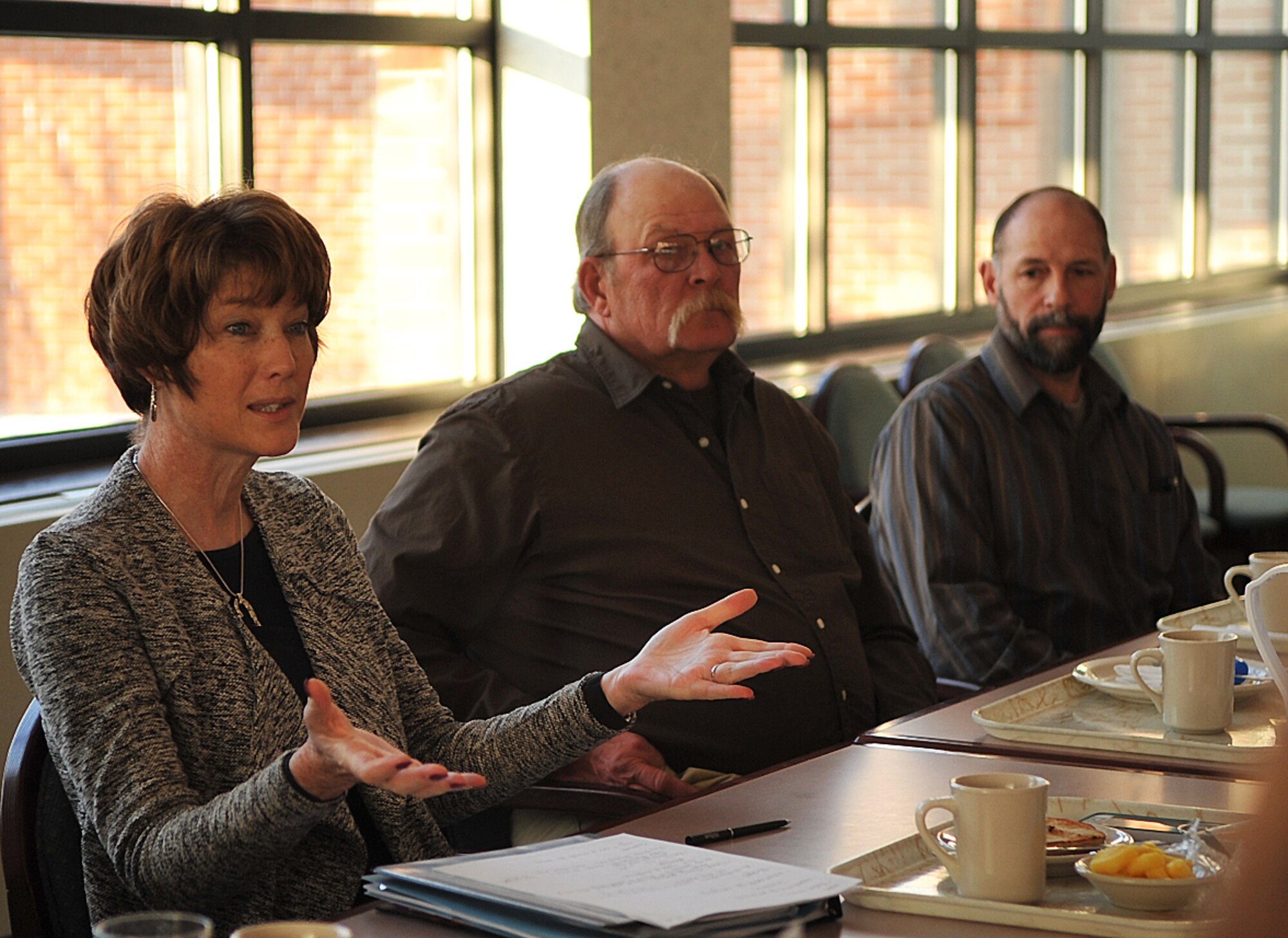 Kathleen Ferguson, principal deputy assistant secretary of the Air Force for installations, environment and energy, speaks with civilians assigned to the 319th Civil Engineer Squadron on Grand Forks Air Force Base, N.D., Feb. 18, 2015. Ferguson started her civil engineer career in 1981 as a design engineer. She visited Grand Forks AFB to commemorate the signing of the Grand Sky Enhanced Use Lease. Attendees were able to introduce themselves and ask questions about topics related to civil engineering. (U.S. Air Force photo/Airman 1st Class Bonnie Grantham)