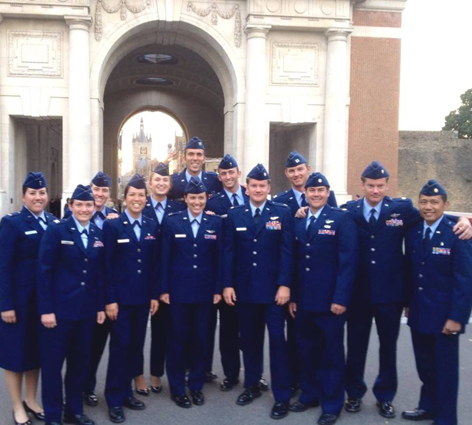 The U.S. Air Force mens and womens tennis team poses in front of the Menin Gate in Ypres, Belgium.  There for the 2014 HQ Allied Air Command International Tennis Tournament, they had the opportunity to witness the 100 Year “Last Post” Ceremony, honoring the soldiers lost at Ypres Salient during World War I. This was the scene of some of the biggest battles during that war. A salient refers to a battlefield feature that projects into enemy territory, thus leaving soldiers in the salient surrounded on three sides, by the enemy. The Fifth Battle of Ypres in August, 1918, began the Hundred Days Offensive, which pushed the Germans out of the salient. They did not return. (Courtesy photo)