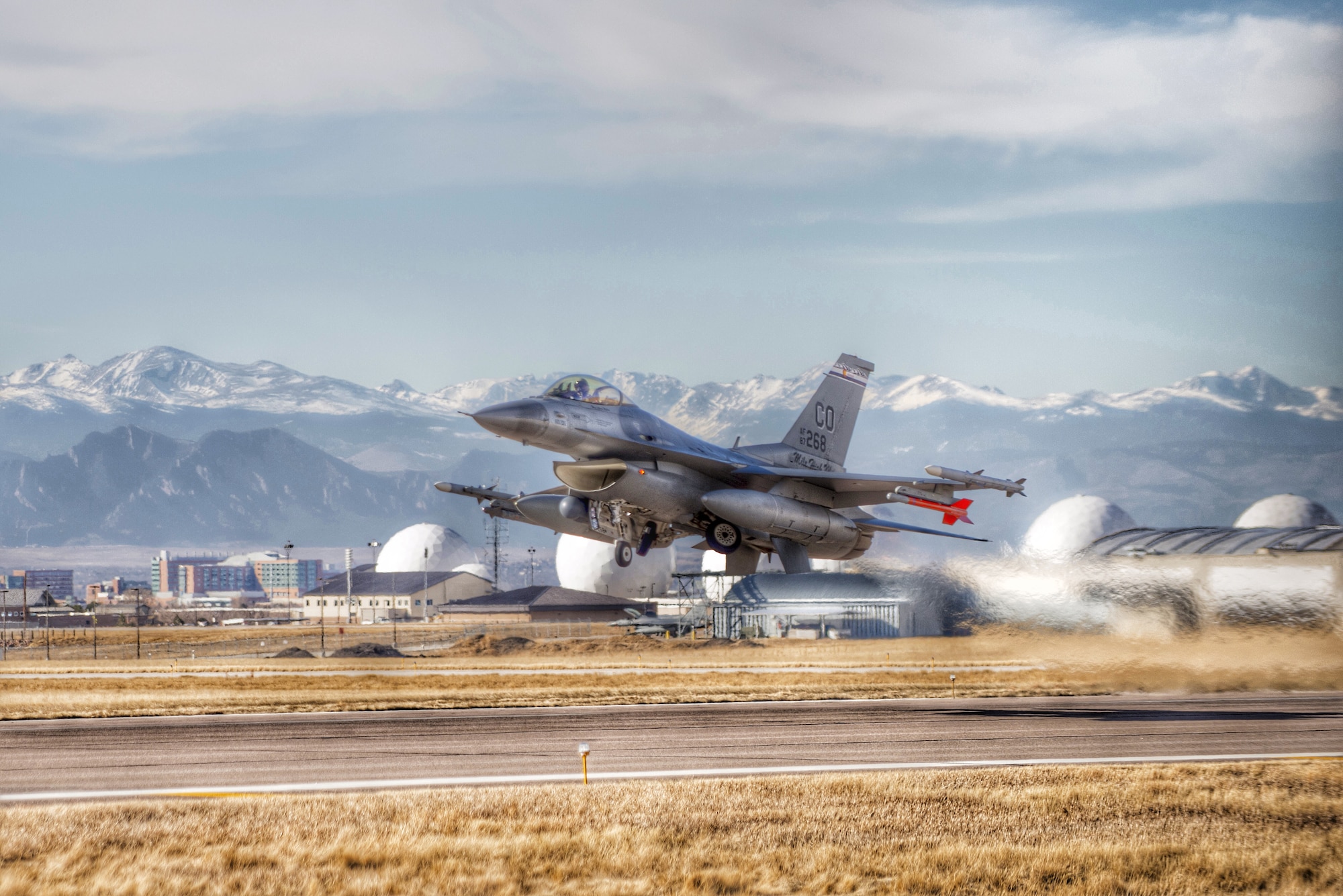 A U.S. Air Force F-16 Fighting Falcon from the 120th Fighter Squadron, Colorado Air National Guard, takes off for a training mission at Buckley Air Force Base, Aurora Colo., Jan. 27, 2015. The 120th FS along with the 140th Wing are preparing for a deployment to the Republic of Korea to demonstrate the United States' continual commitment to stability and security in the Asia-Pacific Region. (U.S. Air National Guard High Dynamic Range photo by, Tech. Sgt. Wolfram M. Stumpf)