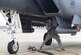 A 335th Aircraft Maintenance Unit Airman prepares a 335th Fighter Squadron F-15E Strike Eagle for hot pit refueling at Seymour Johnson Air Force Base, North Carolina, Feb. 10, 2015. Hot pit refueling alleviates stress on an aircraft’s engines by reducing the number of times they are switched on and off. (U.S. Air Force photo/Senior Airman Ashley J. Thum)