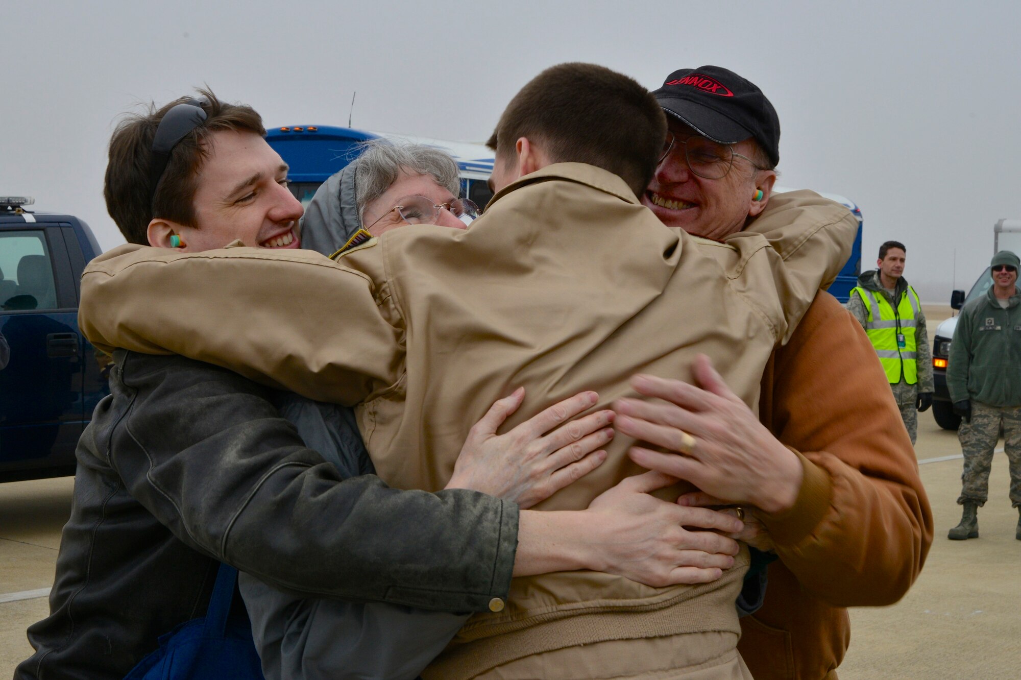 Airman 1st Class Patrick Oberlin, 756th ARS boom operator, greets his family after returning from a deployment to Southwest Asia. (U.S. Air Force Photo / Tech. Sgt. Erica Knight)