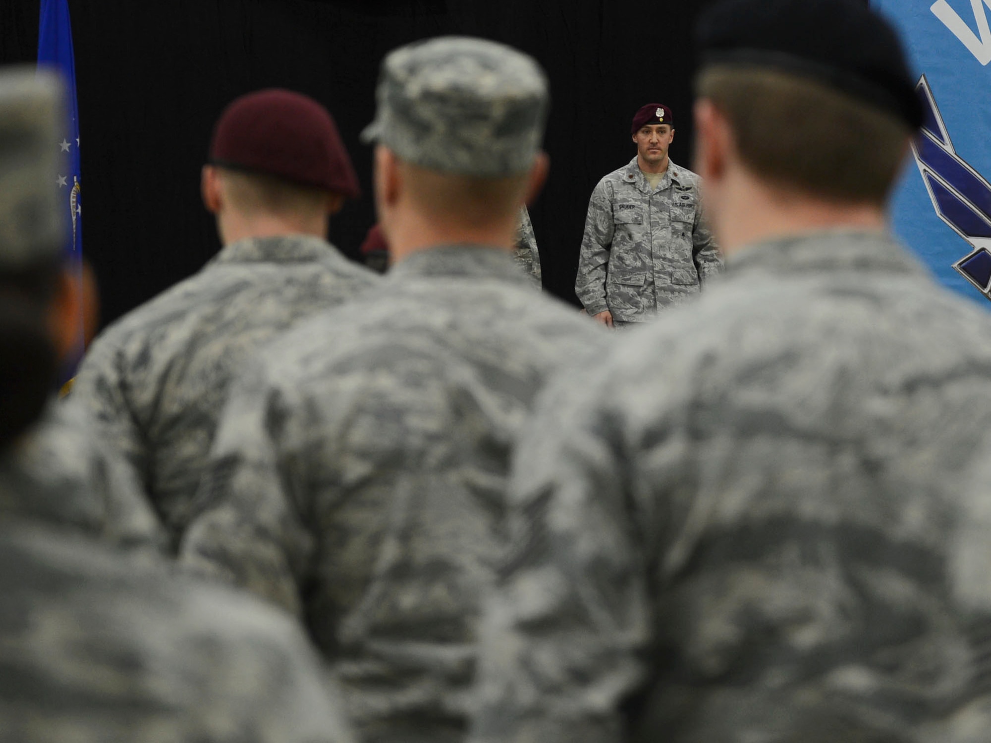 Maj. Patrick Gruber, 57th Rescue Squadron commander, assumes command of the squadron during its activation ceremony at Royal Air Force Lakenheath, England, Feb. 18, 2015. The 57th RQS consists of 35 pararescuemen and equipment personnel already stationed at RAF Lakenheath. (U.S. Air Force photo by Airman 1st Class Dawn M. Weber/Released)