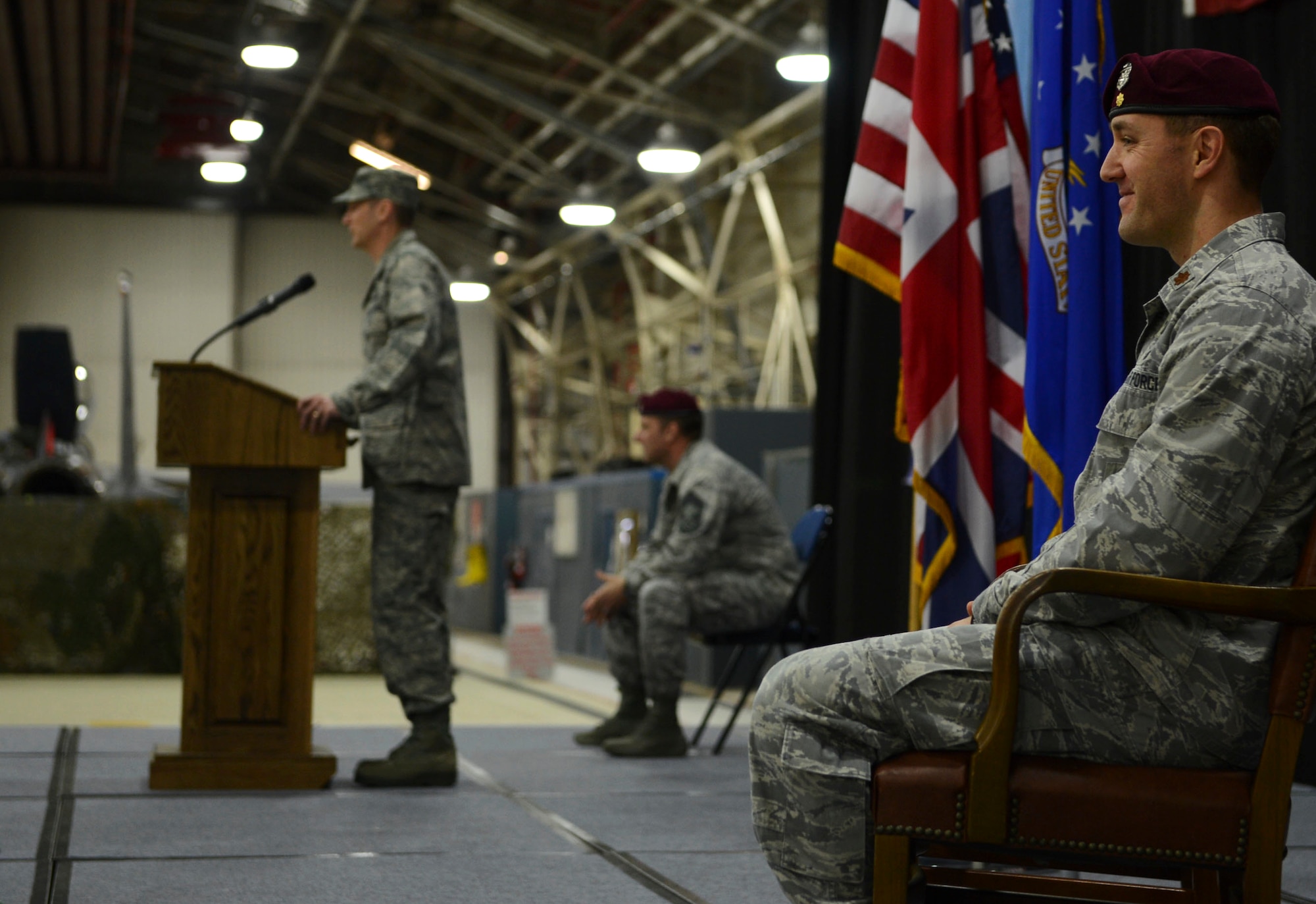 Col. Scottie Zamzow, 48th Operations Group commander, addresses the crowd before presenting command to Maj. Patrick Gruber, during the activation ceremony at Royal Air Force Lakenheath, England, Feb. 18, 2015. The 57th RQS is populated by 35 pararescuemen and equipment personnel already stationed at RAF Lakenheath. (U.S. Air Force photo by Airman 1st Class Dawn M. Weber/Released)