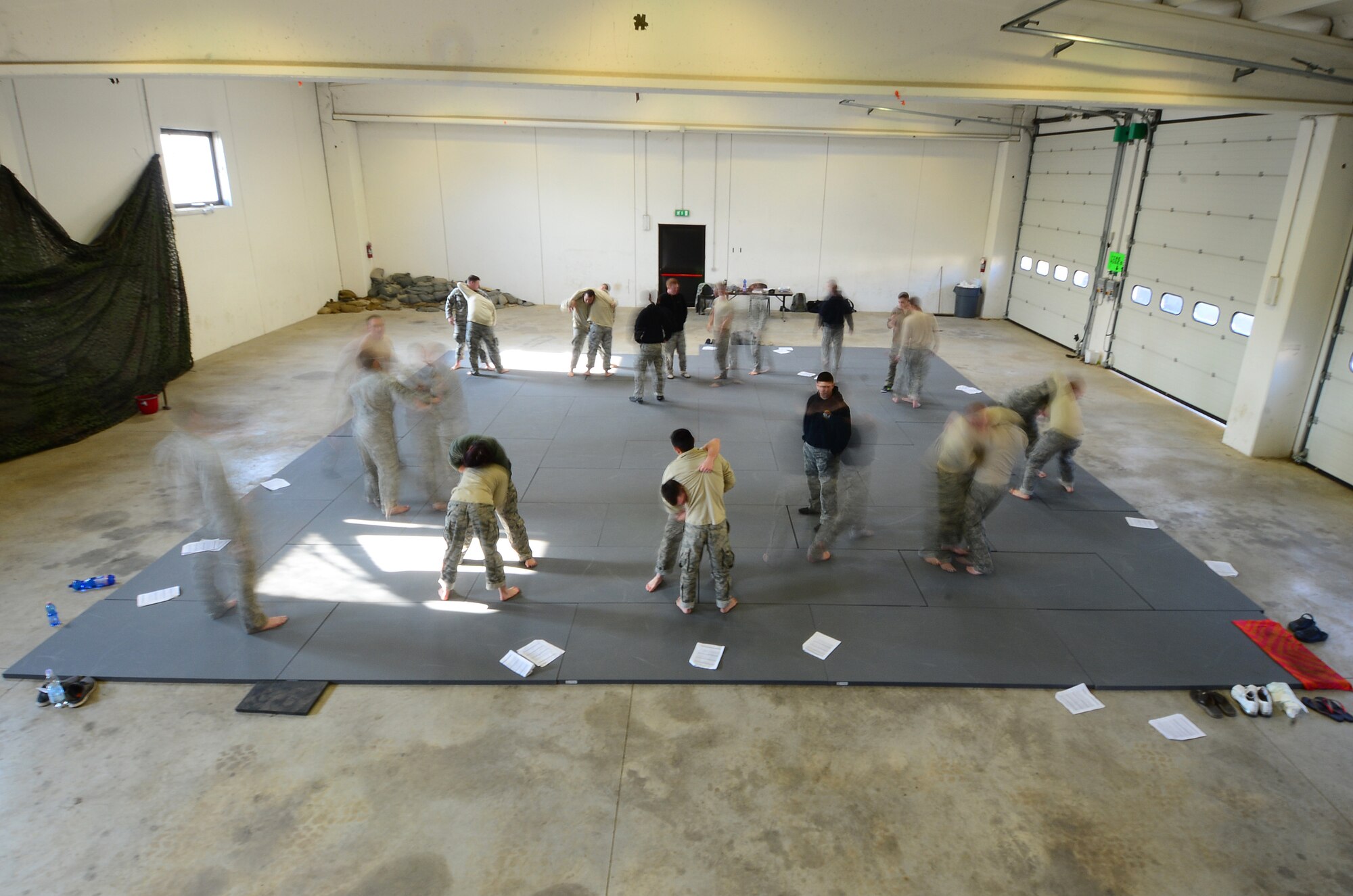Twenty 31st Security Forces Squadron members participated in a week-long combative skills training course at Aviano Air Base, Italy. All Airmen are taught Air Force combatives in military basic training, but this combination of Army and Air Force combative skills program is security forces specific and intends to teach security forces members how to protect themselves in the line of duty. (U.S. Air Force photo by Senior Airman Matthew Lotz/Released)