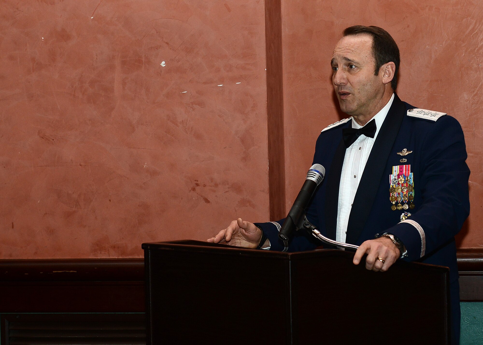 Lt. Gen. Tom Jones, U.S. Air Forces in Europe and Air Forces Africa vice
commander, speaks at the 31st Fighter Wing Annual Awards Banquet, Feb. 13,
2015, at Aviano Air Base, Italy. Jones, and Chief Master Sgt. James Davis,
USAFE-AFAFRICA command chief, visited the base to meet with Airmen and
attend the banquet. (U.S. Air Force photo/Staff Sgt. R.J. Biermann) 
