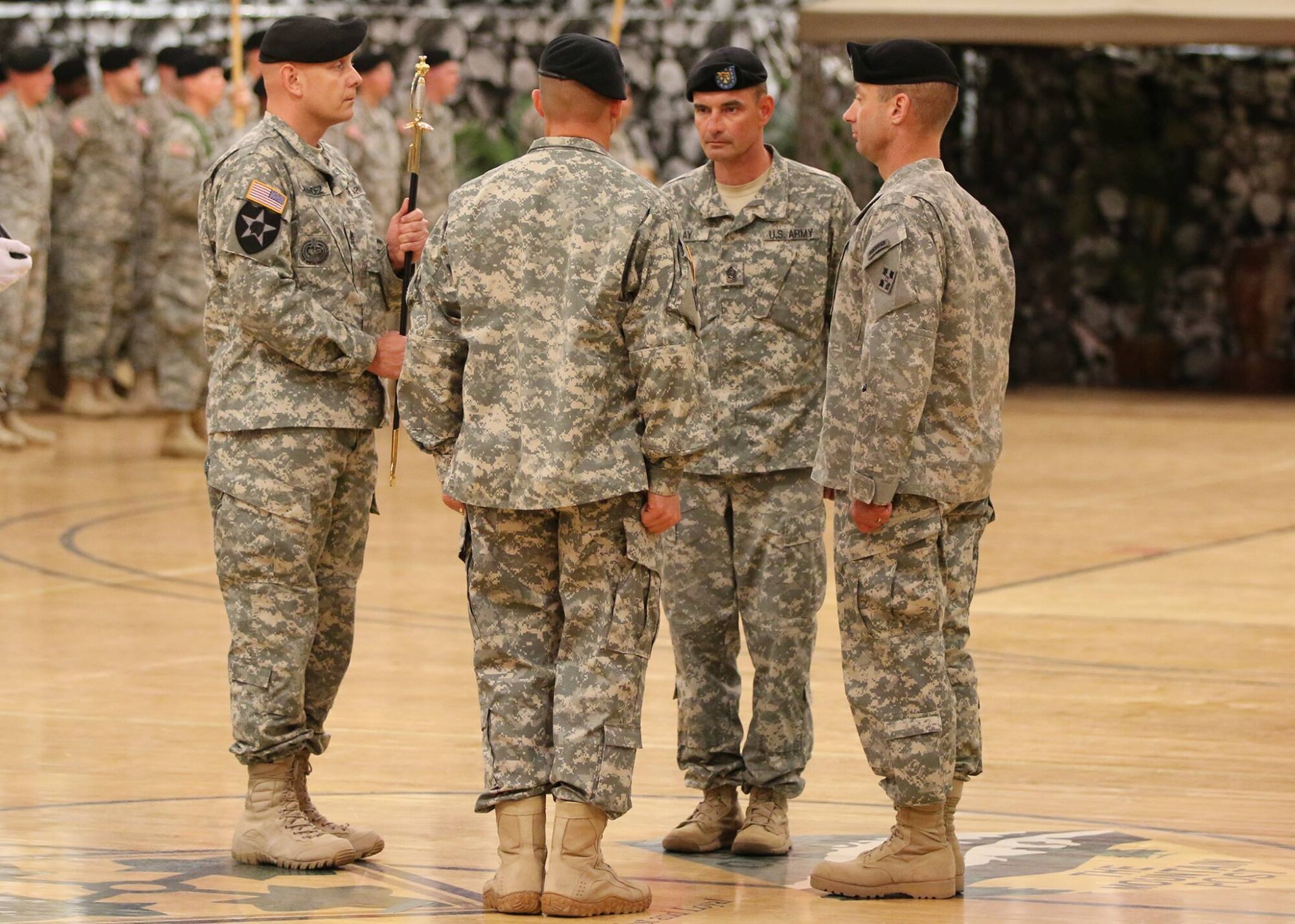 The 4th Infantry Brigade Combat Team, 4th Infantry Division, held a change of responsibility ceremony, Feb. 11, 2015, at the Special Events Center. After three deployments with the Mountain Warriors, Command Sgt. Maj. Danny Day passed his responsibilities to Command Sgt. Maj. Sammy Sparger. (U.S. Army photo by Sgt. Nelson Robles, 4th IBCT, 4th Inf. Div. PAO)