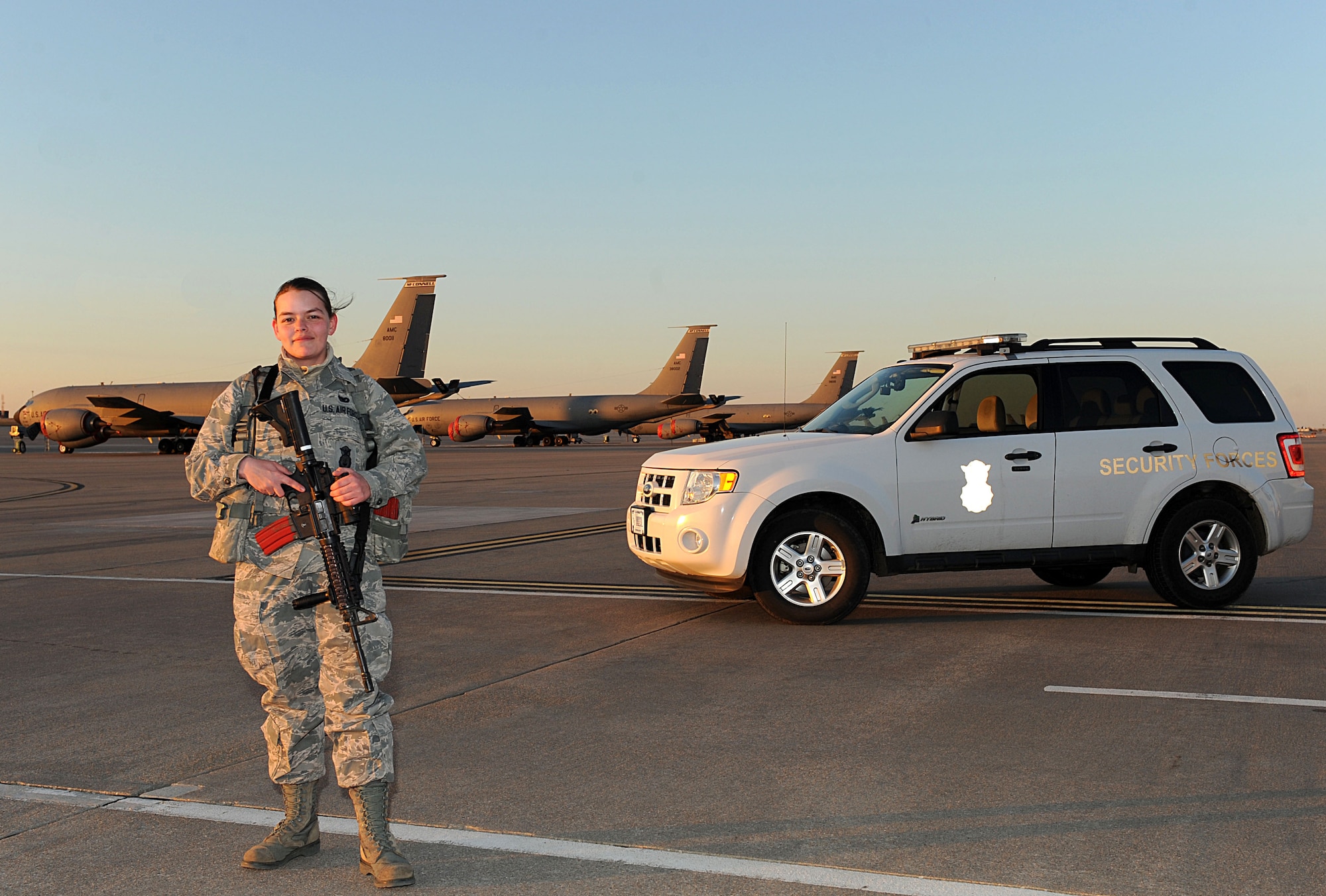 Airman 1st Class Dannielle Taylor, 22nd Security Forces Squadron entry controller, poses for a photo, Feb. 2, 2015, at McConnell Air Force Base, Kan. Taylor is part of a team of security forces Defenders who patrol the flightline and prevent unauthorized entries into controlled areas 24 hours a day. (U.S. Air Force photo by Airman 1st Class David Bernal Del Agua)