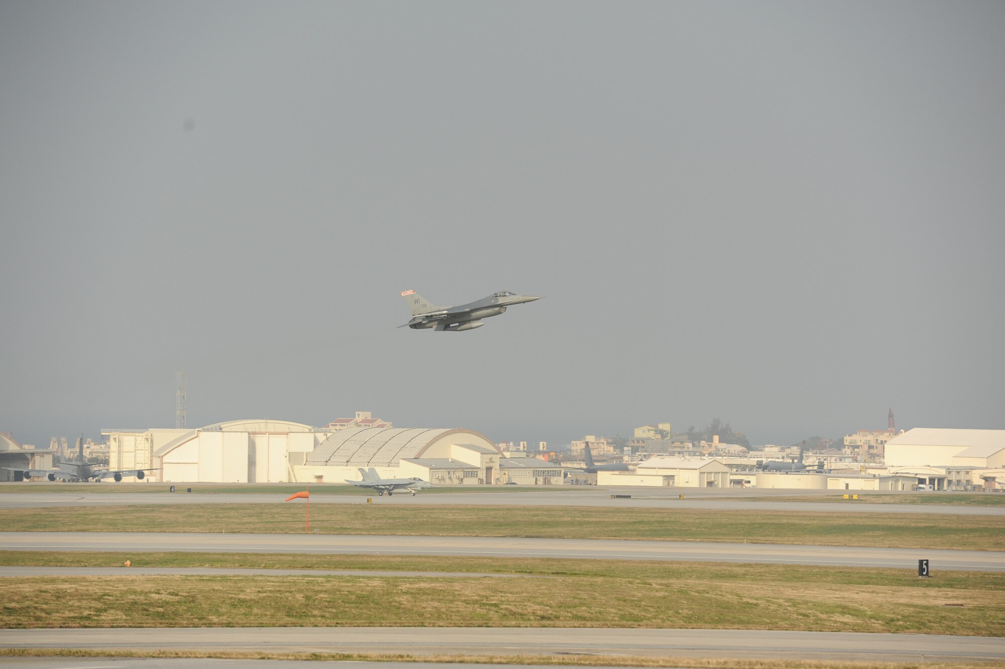 U.S. Air Force Lt. Col. Matthew C. McCunn, Wisconsin Air National Guard, 115th Fighter Wing pilot, takes off from Kadena Air Base, Japan, Feb. 13, 2015. McCunn reached a career total of 3,000 flying hours while deployed with his Air National Guard unit from Wisconsin to Kadena for joint training with the 18th Wing. (U.S. Air Force photo by Airman 1st Class Zackary A. Henry)