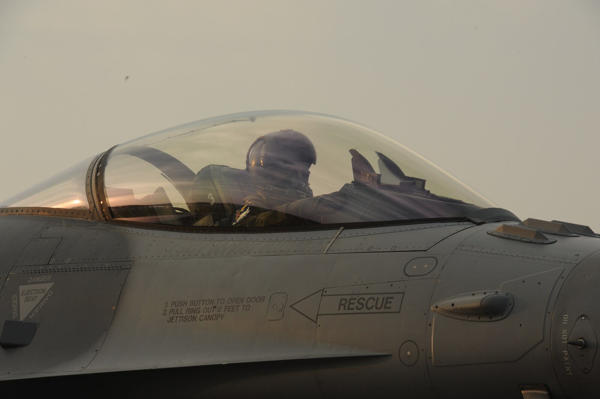 U.S. Air Force Lt. Col. Matthew C. McCunn, Wisconsin Air National Guard, 115th Fighter Wing pilot, taxis on the flightline before take off from Kadena Air Base, Japan, Feb. 13, 2015. McCunn reached a career total of 3,000 flying hours while at Kadena for joint training with his Air National Guard unit from Wisconsin. (U.S. Air Force photo by Airman 1st Class Zackary A. Henry)