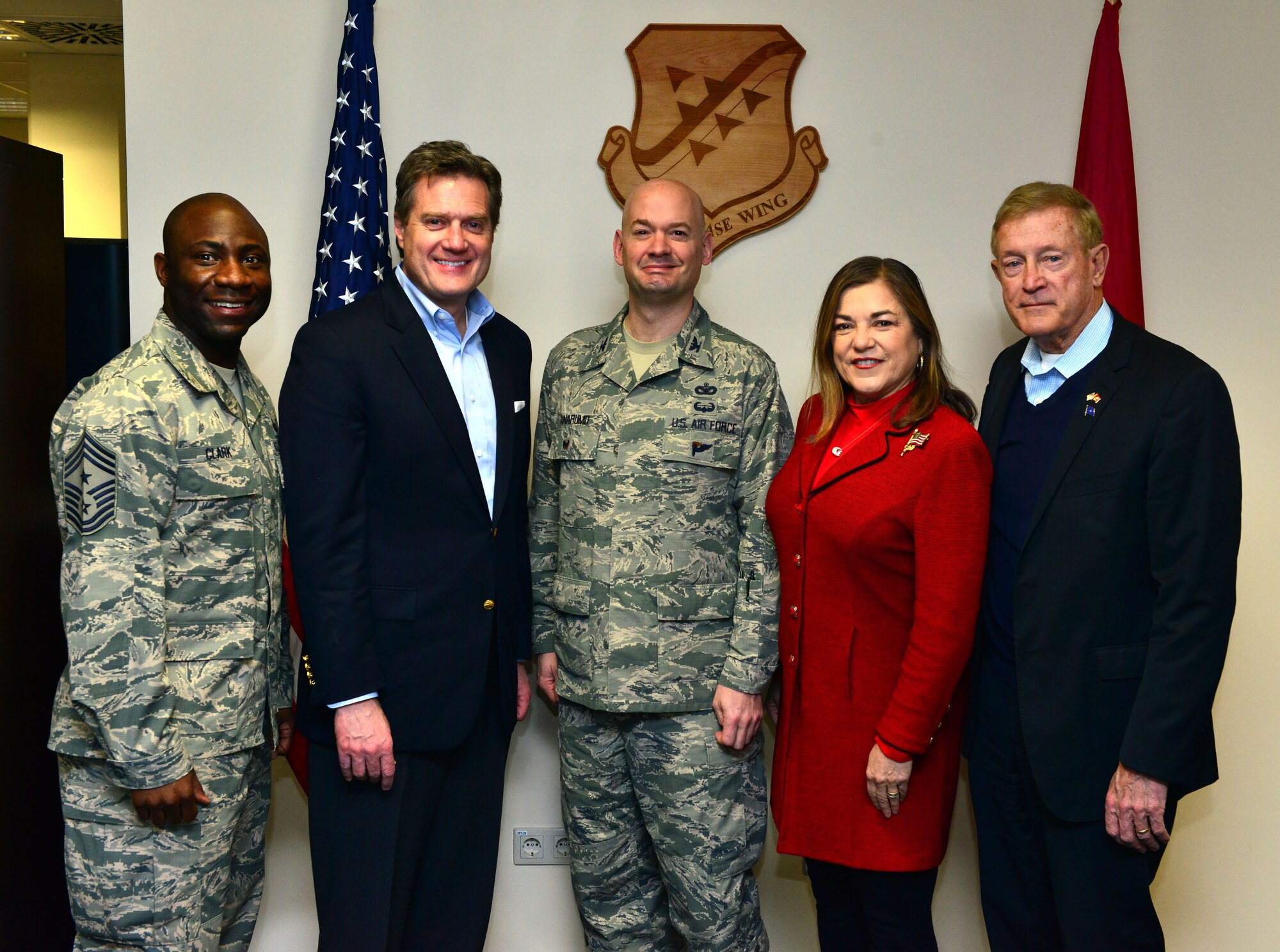 Col. Mark Anarumo, 39th Air Base Wing vice commander and Chief Master Sgt. Vegas Clark, 39th ABW commander chief, pose for a picture with congressional delegates from California and Ohio during a one-day visit Feb. 18, 2015, at Incirlik Air Base, Turkey. The visit gave the congressional representatives a chance to meet with wing leadership, talk with Airmen and receive important mission briefs and a tour of the base. (U.S. Air Force photo by Senior Airman Michael Battles)