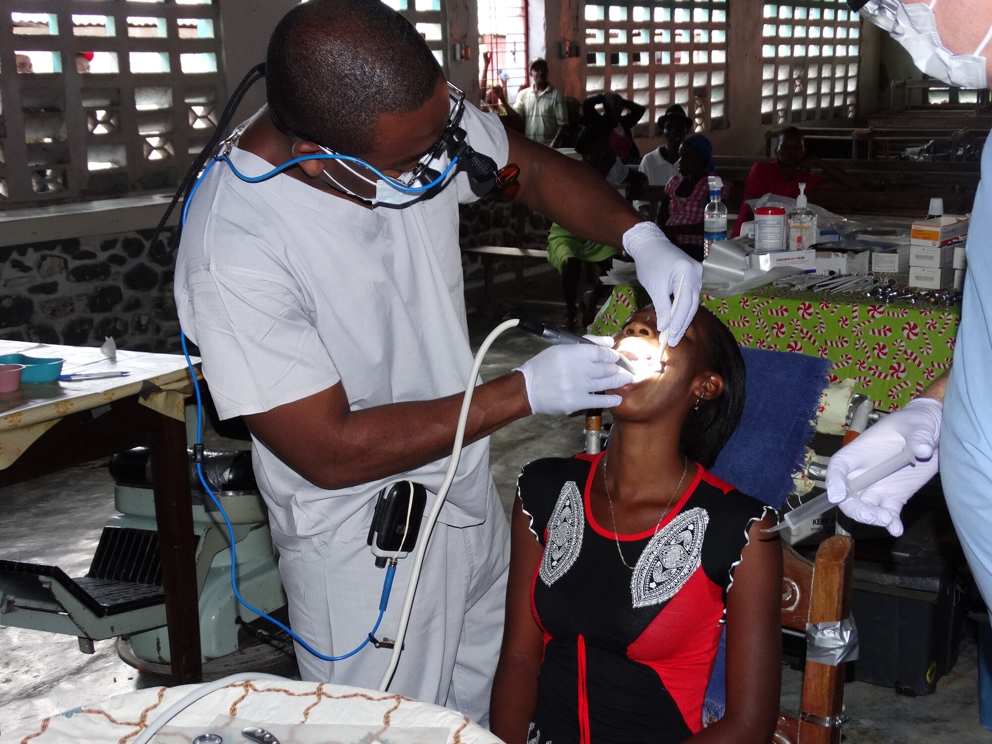 Maj. Stanley Michel, general dentist, 914th Aeromedical Staging Squadron, performs dental care on a patient during a recent trip to the Macieux region of the Republic of Haiti. Michel traveled to Haiti as part of a humanitarian visit. (Courtesy photo by Maj. Stanley Michel)