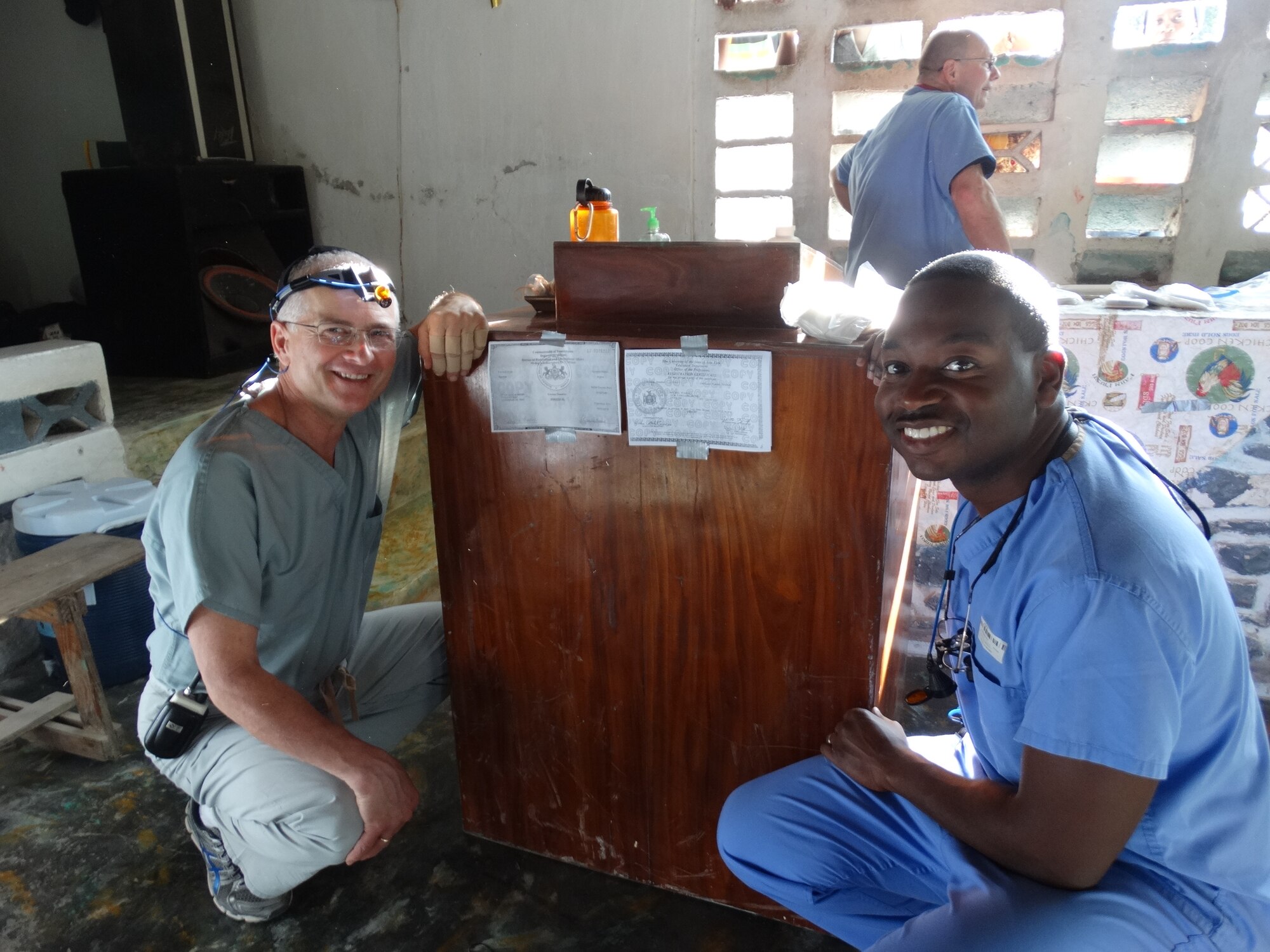 Col. Victor Brown, commander, and Maj. Stanley Michel, general dentist, 914th Aeromedical Staging Squadron, pose for a picture during a recent trip to the Macieux region of the Republic of Haiti. Brown and Michel participated in a humanitarian visit which provided hundreds with necessary medical care. (Courtesy photo by Maj. Stanley Michel)